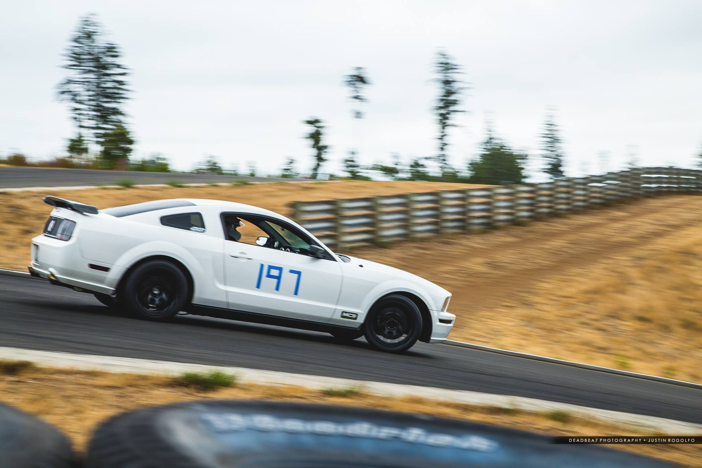 White Ford S197 Mustang GT with 18" EC-7 Apex wheels in Satin Black