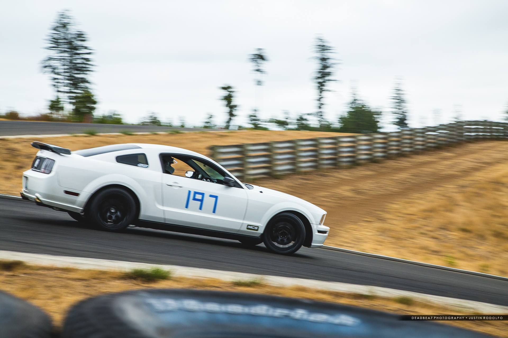 White Ford S197 Mustang GT with 18" EC-7 Apex wheels in Satin Black