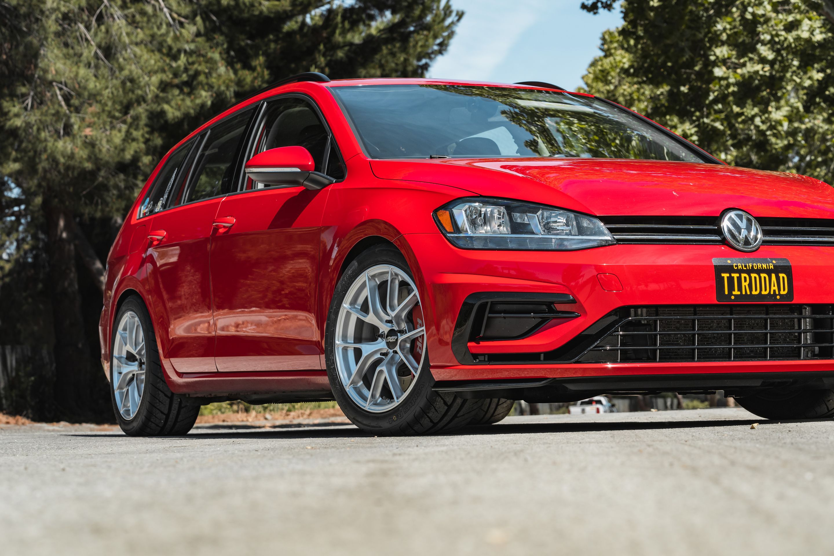 Red VW MK7 Alltrack/SportWagen Golf SportWagen with 17" VS-5RS Apex wheels in Brushed Clear