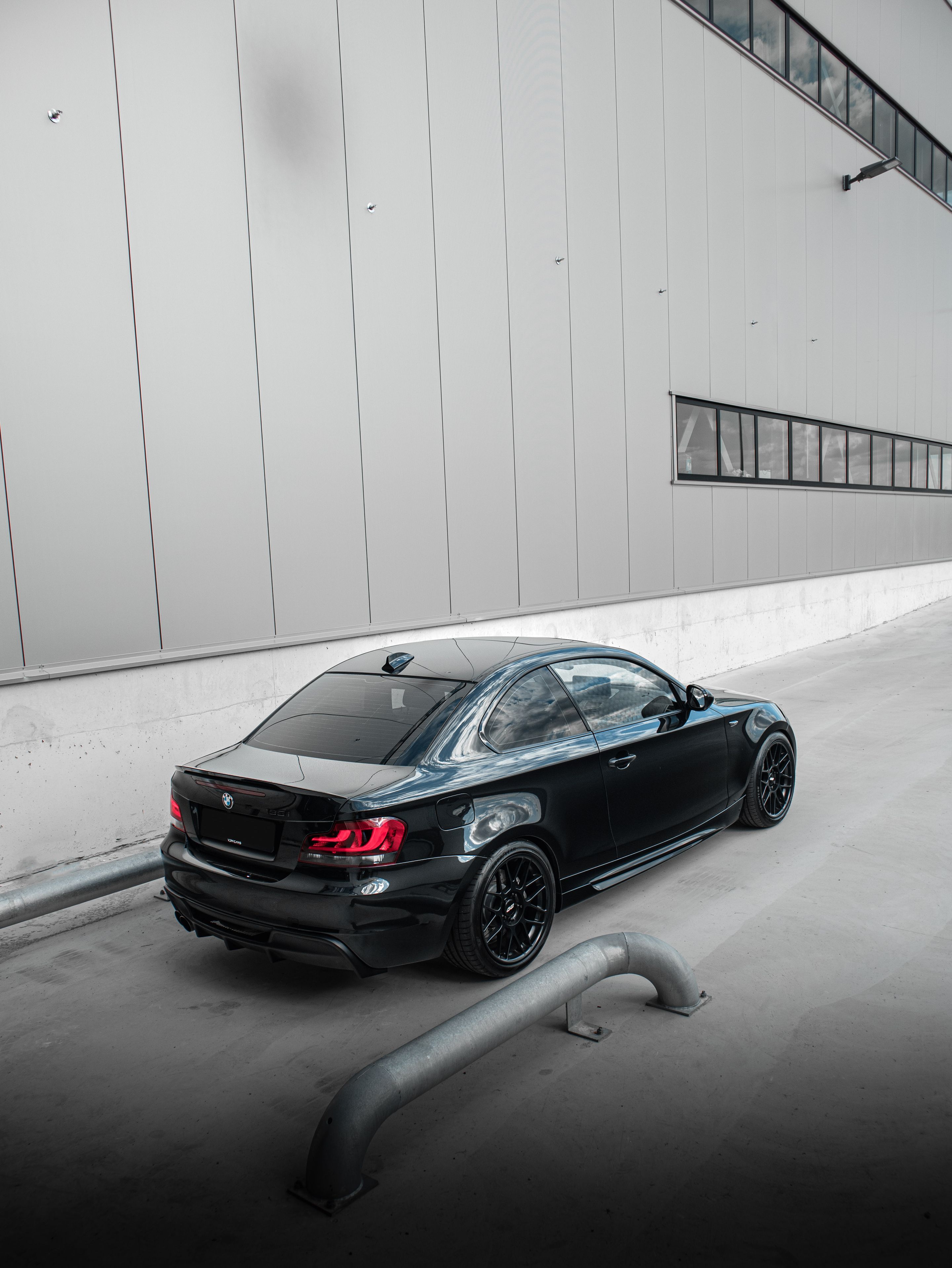 Black BMW E82 Coupe 1 Series with 18" ARC-8 Apex wheels in Satin Black