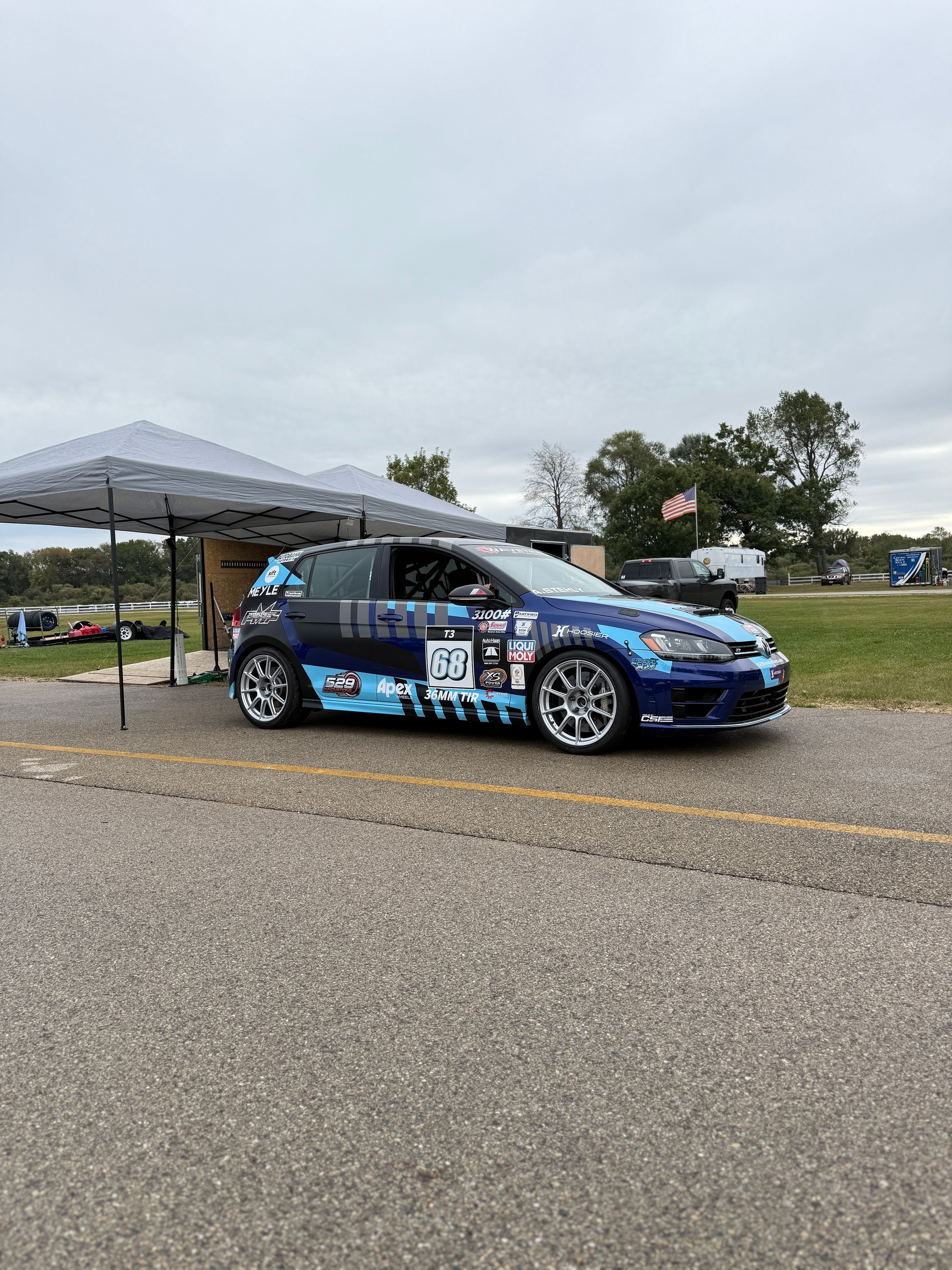 Race Livery VW MK7 Golf R with 18" SM-10 Apex wheels in Race Silver