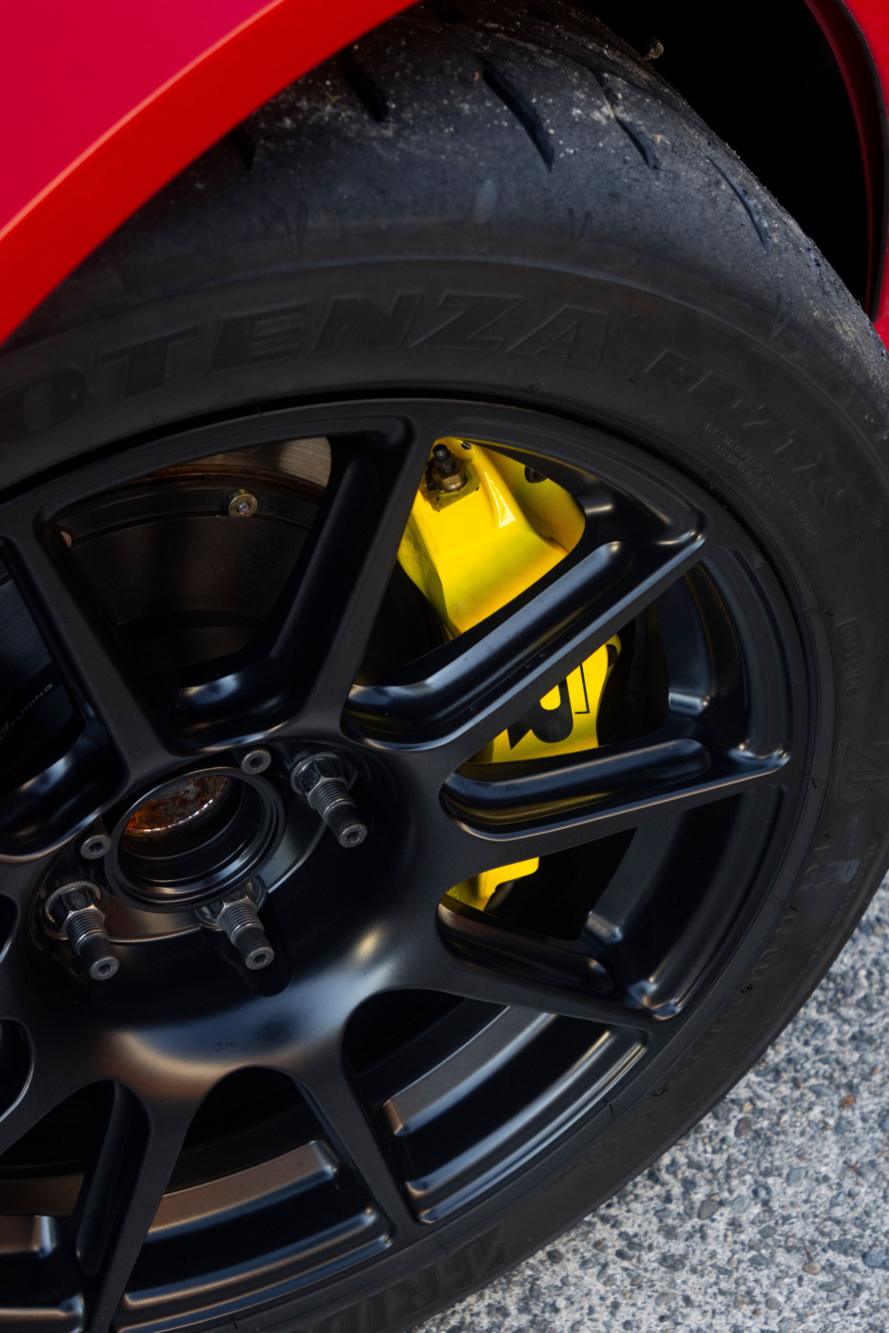 Red VW MK5 Golf with 17" SM-10 Apex wheels in Satin Black