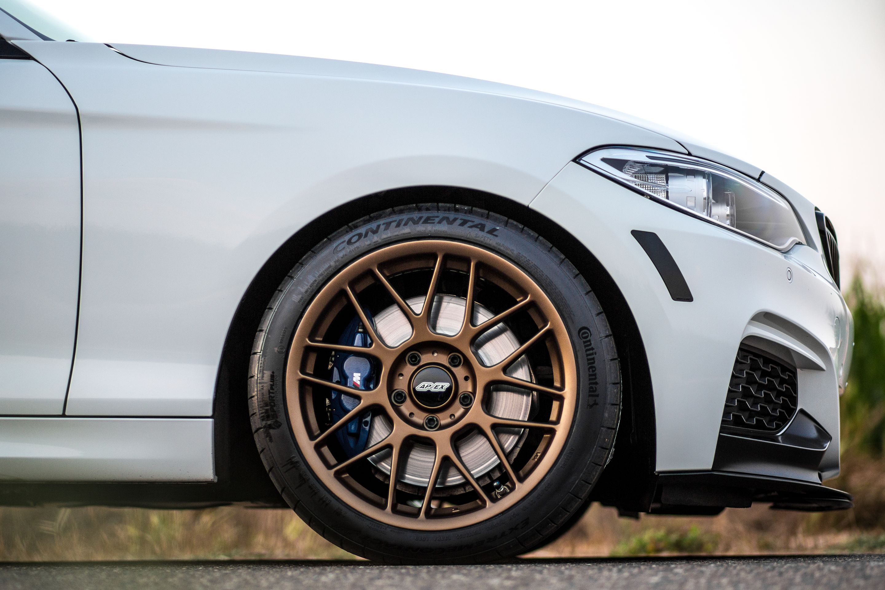 White BMW F22 Coupe 2 Series with 18" ARC-8 Apex wheels in Satin Bronze