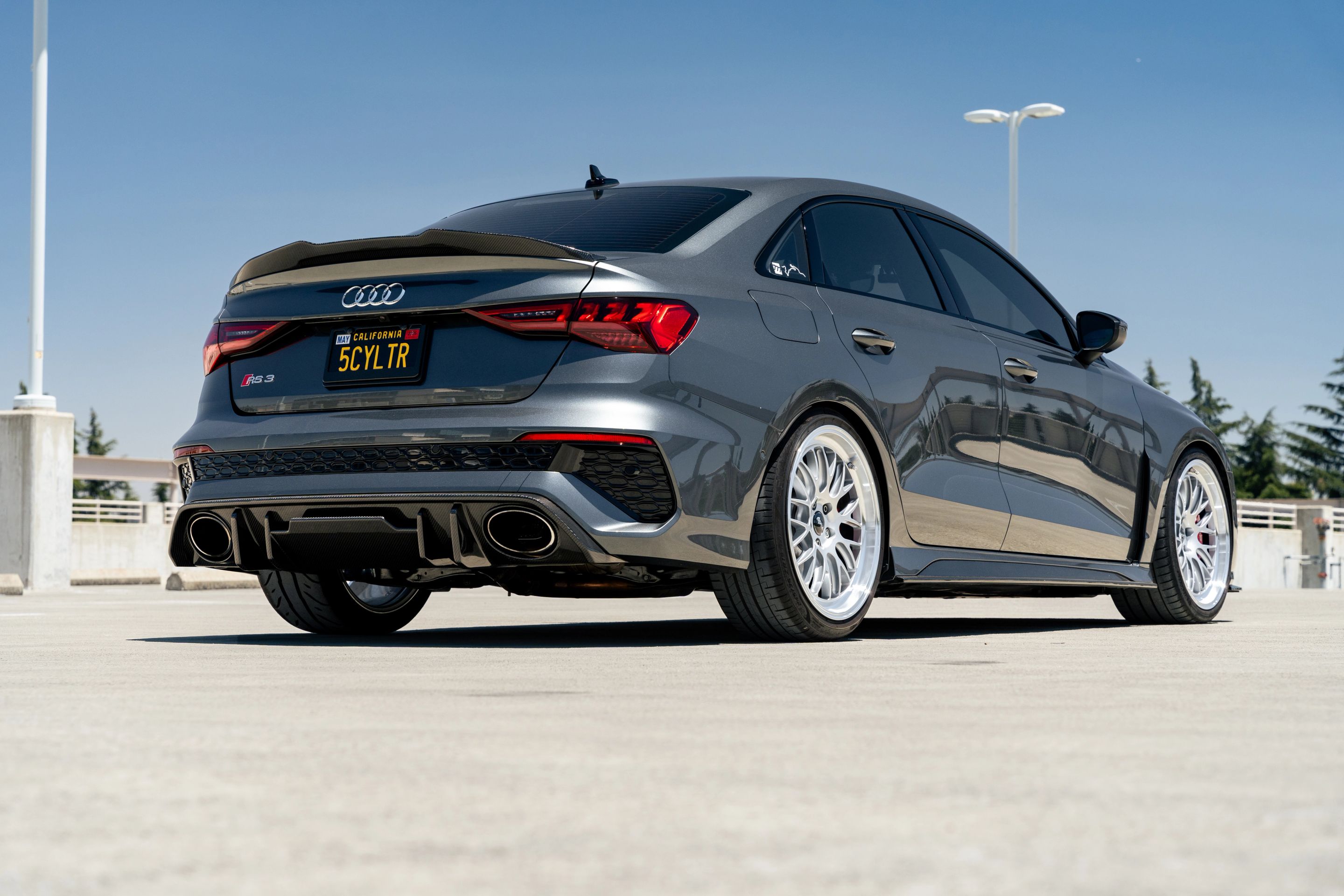 Grey Audi 8Y RS 3 with 19" ML-10RT Apex wheels in Machined Lip Race Silver