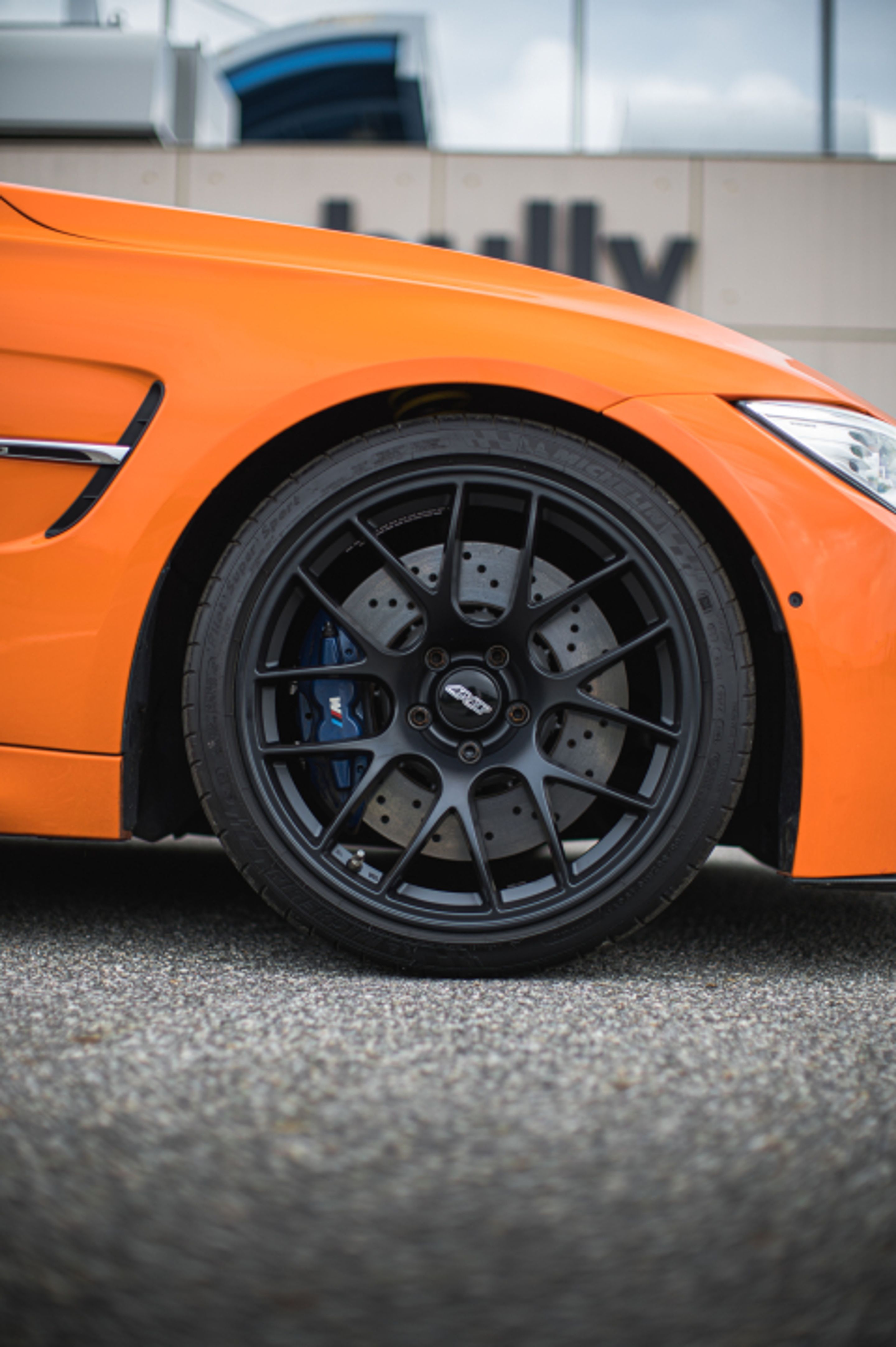 Orange BMW F80 M3 with 19" EC-7 Apex wheels in Satin Black