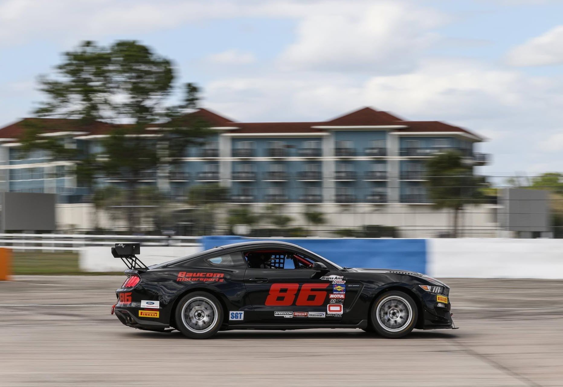 Black Ford S550 Mustang GT350 with 18" EC-7 Apex wheels in Race Silver