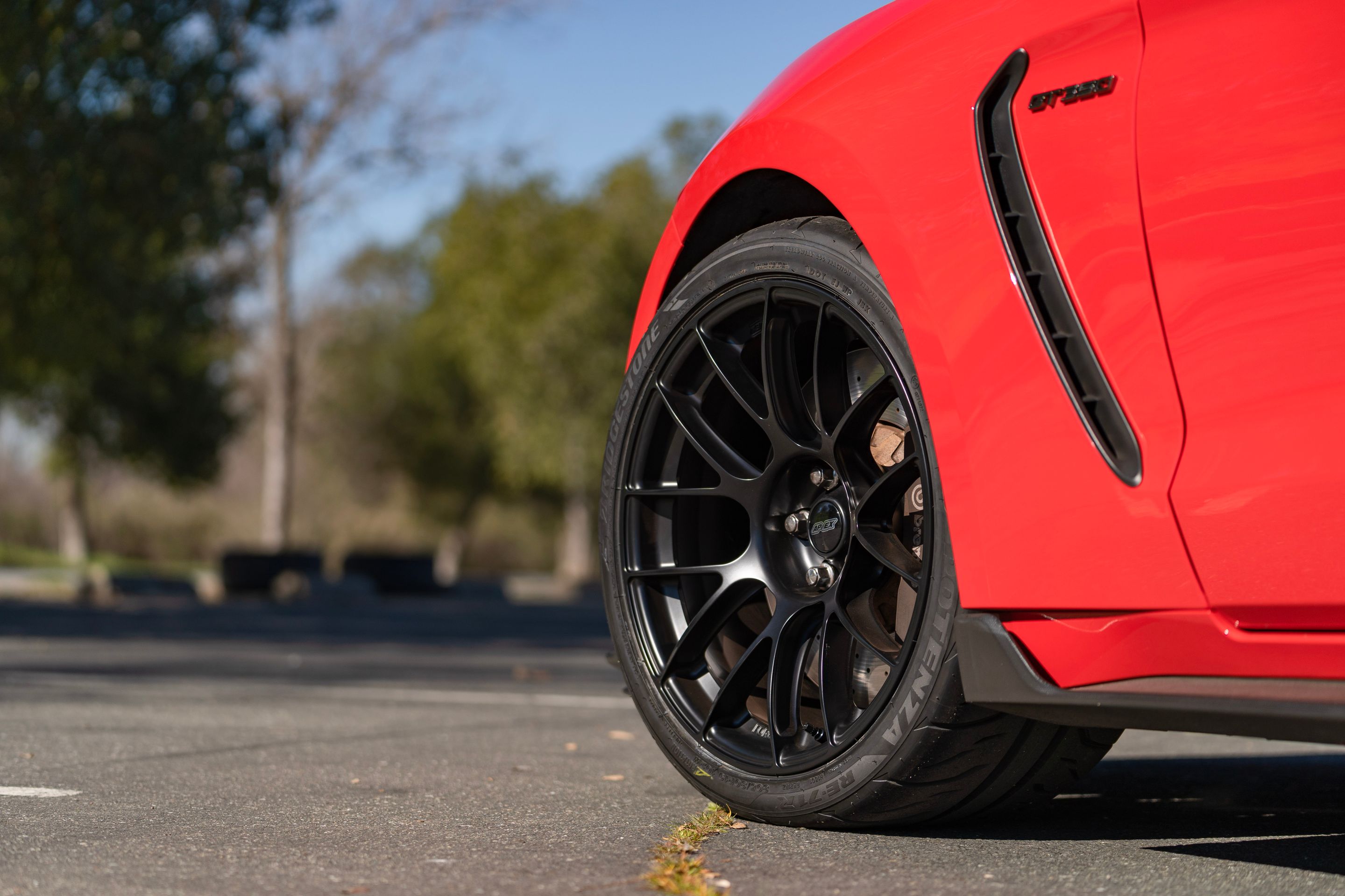 Red Ford S550 Mustang GT350 with 19" EC-7RS Apex wheels in Satin Black