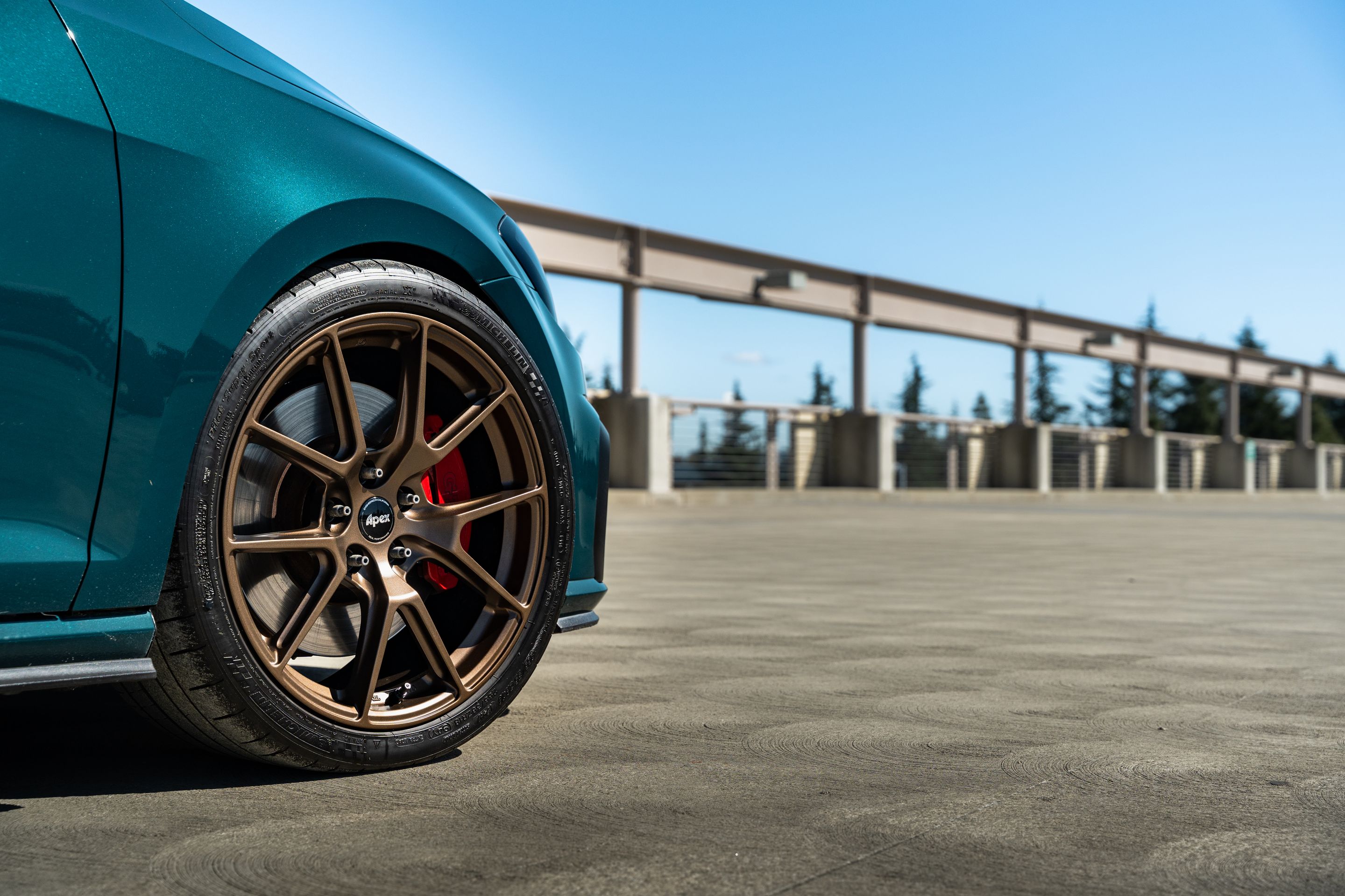 Green VW MK7 GTI with 18" VS-5 Apex wheels in Satin Bronze