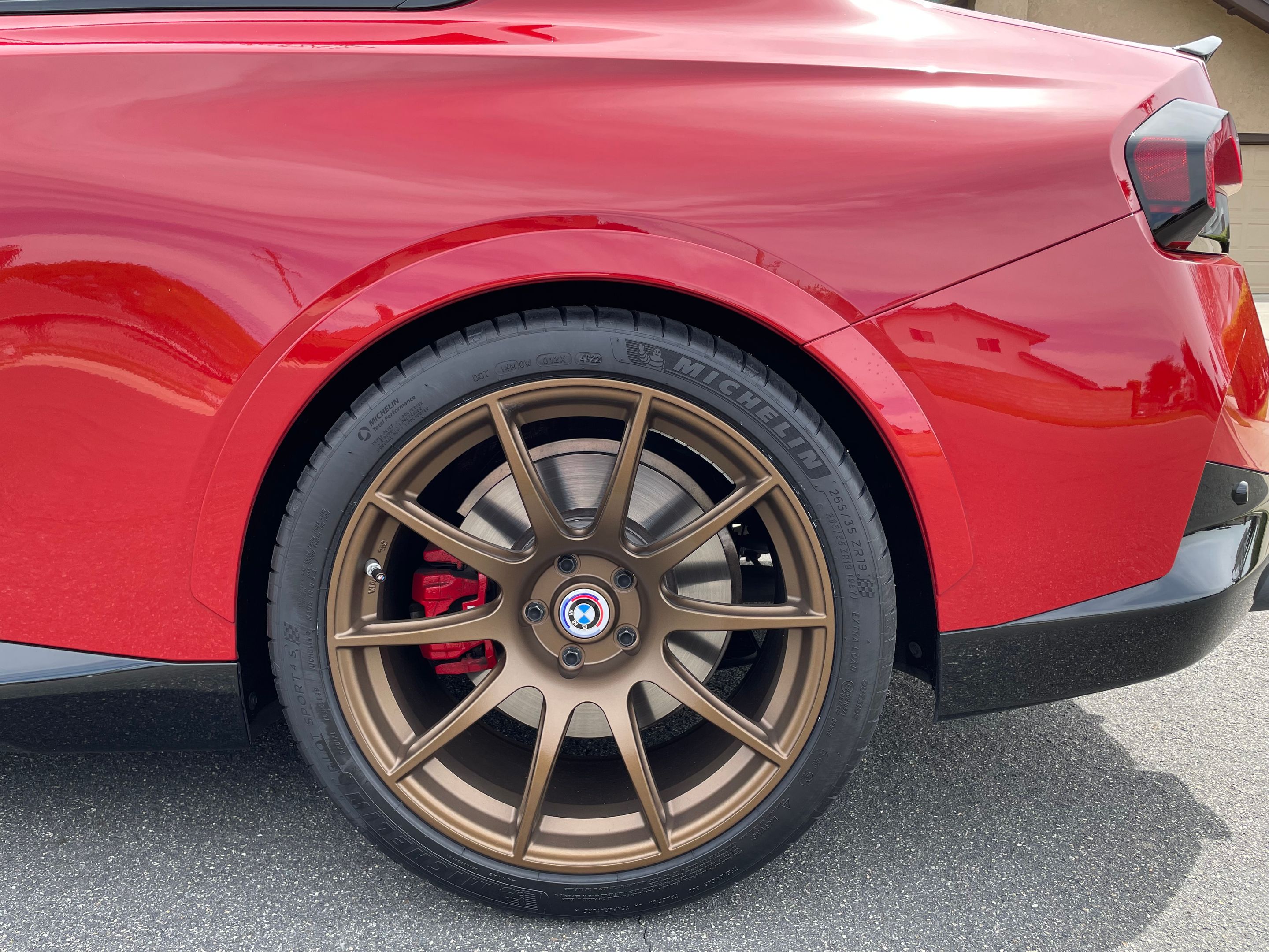 Red BMW G42 2 Series with 19" SM-10 Apex wheels in Satin Bronze