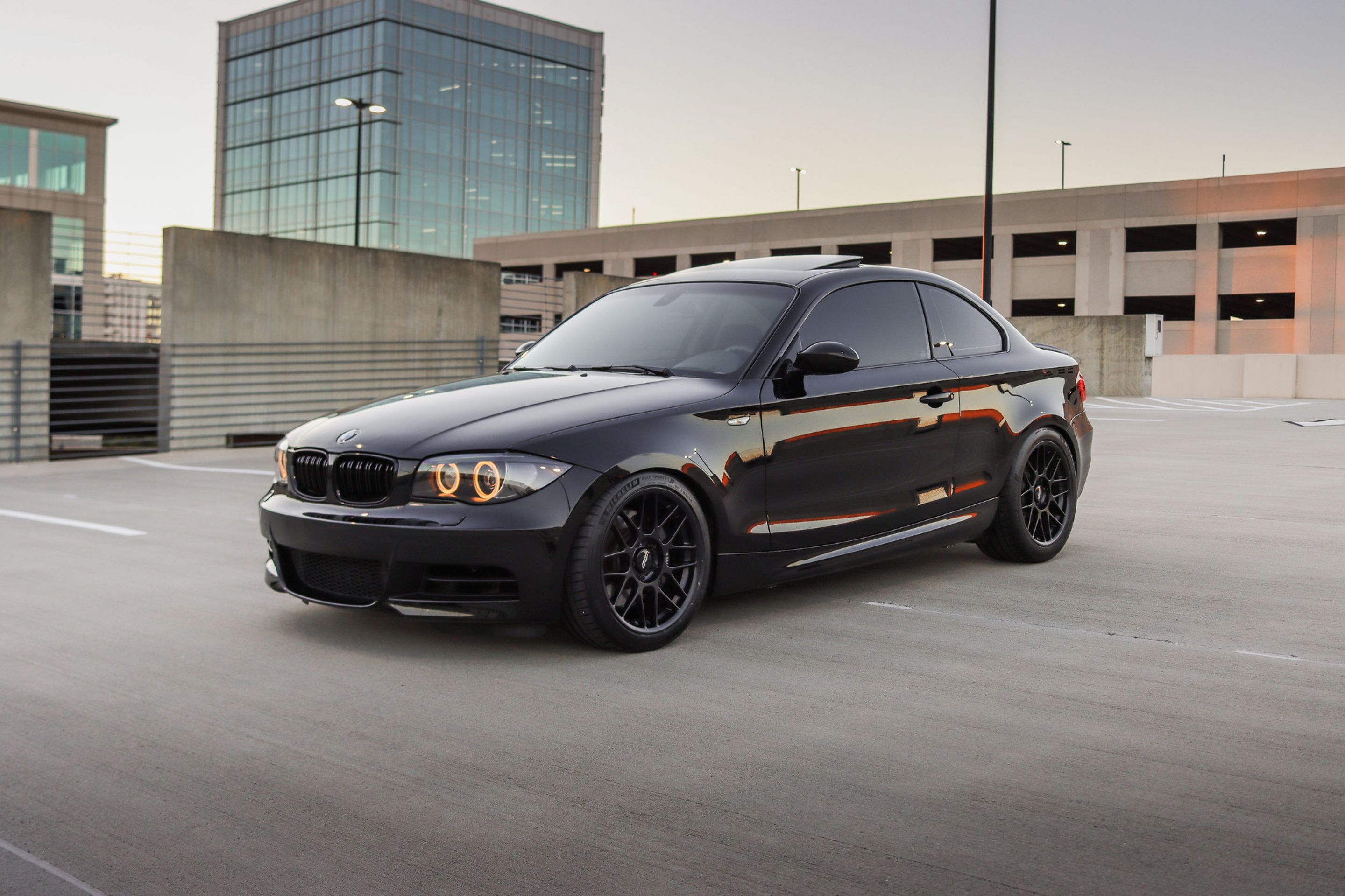 Black BMW E82 Coupe 1 Series with 18" ARC-8 Apex wheels in Satin Black
