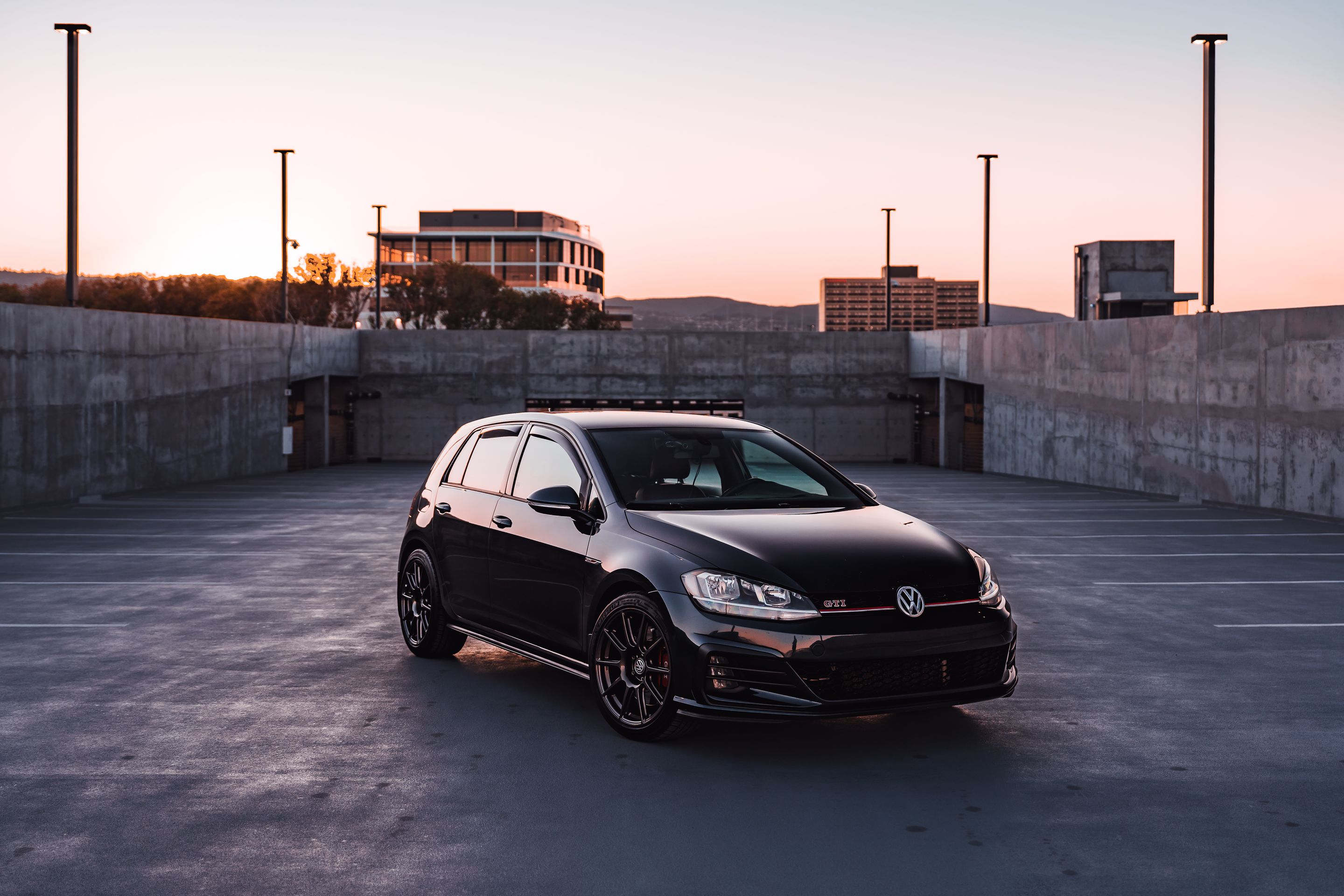 Black VW MK7 GTI with 17" SM-10 Apex wheels in Anthracite