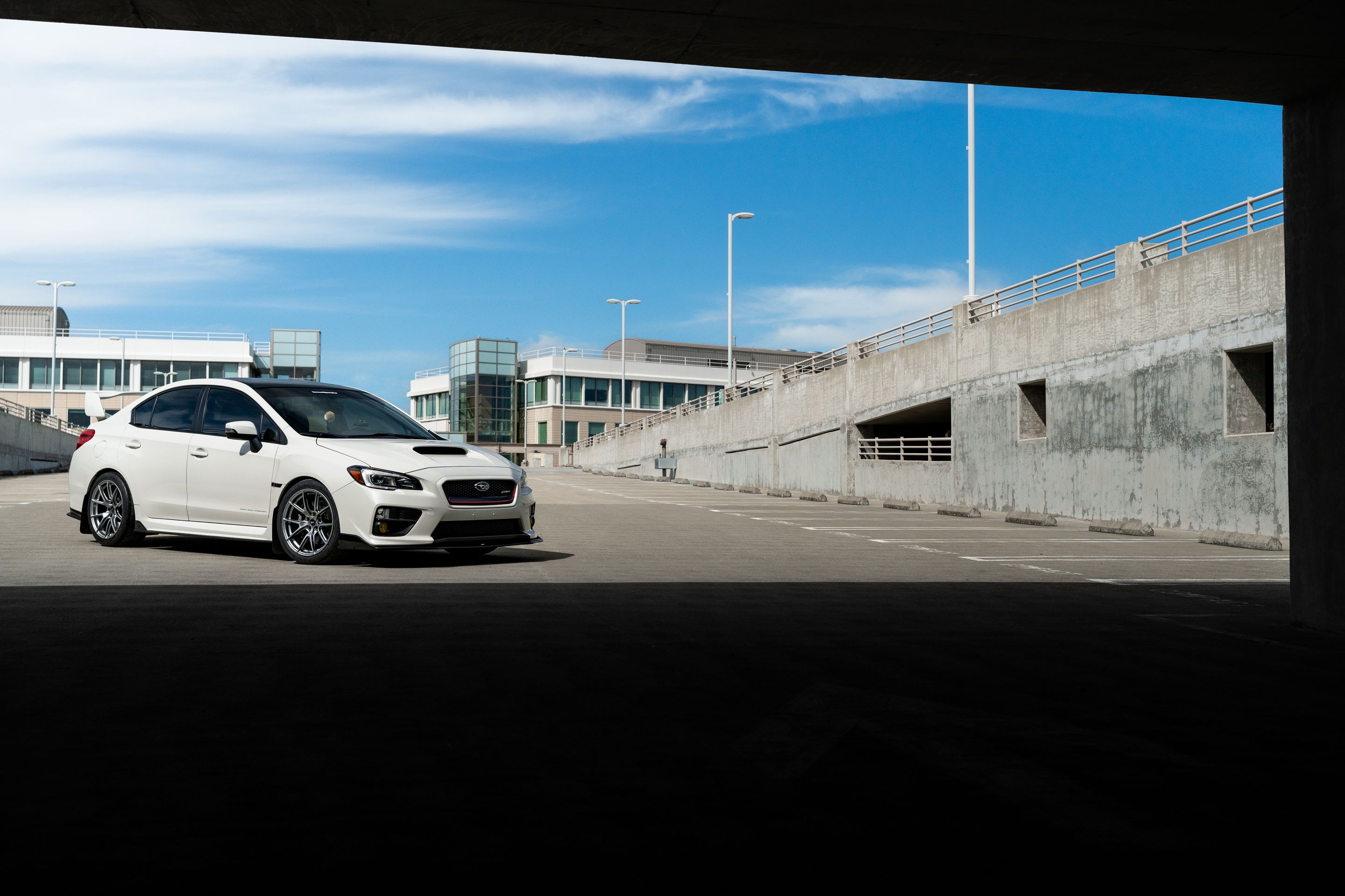 White Subaru VA WRX STI with 18" VS-5 Apex wheels in Hyper Black
