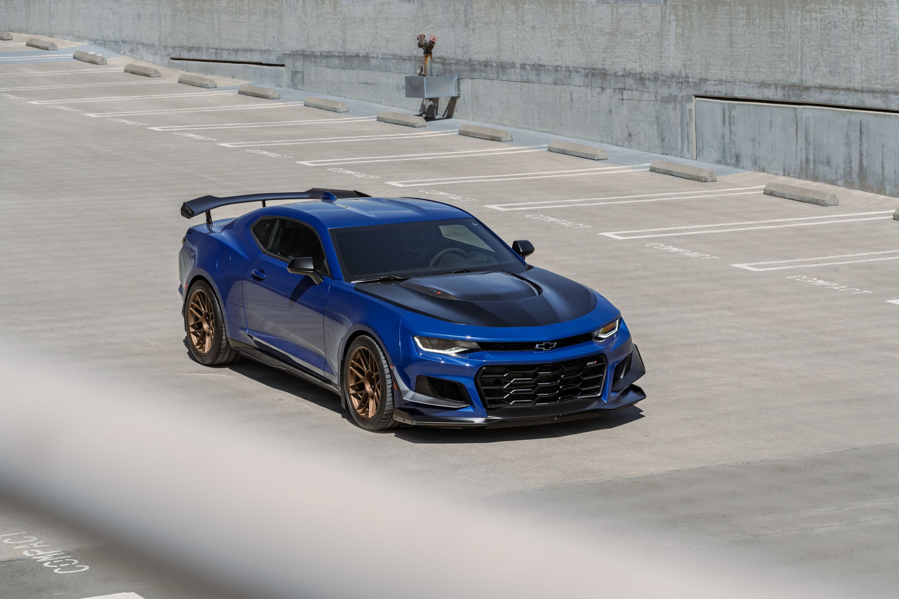 Blue Chevrolet 6th Gen Camaro ZL1 1LE with 19" ARC-8 Apex wheels in Satin Bronze