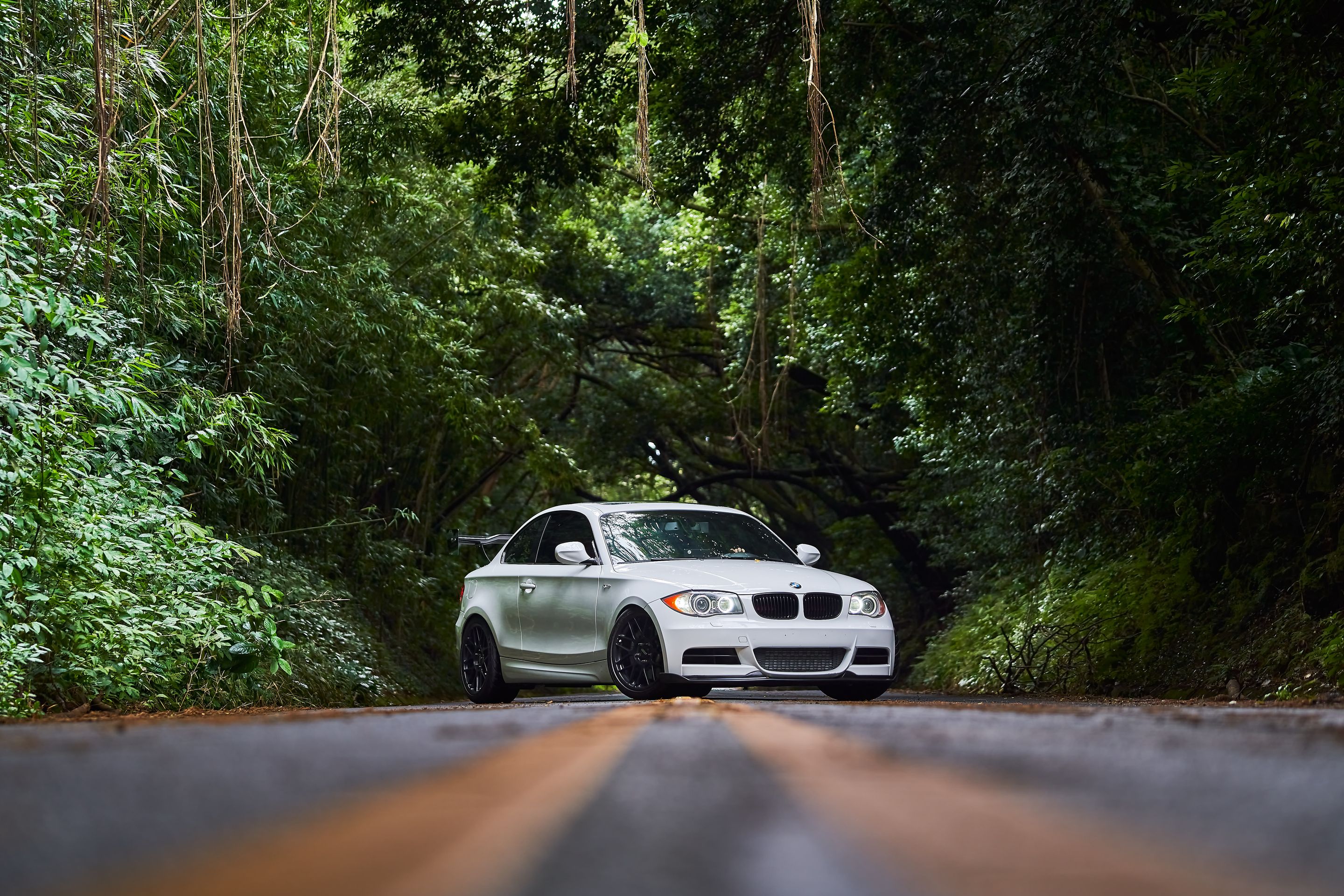 White BMW E82 Coupe 1 Series with 18" ARC-8 Apex wheels in Satin Black