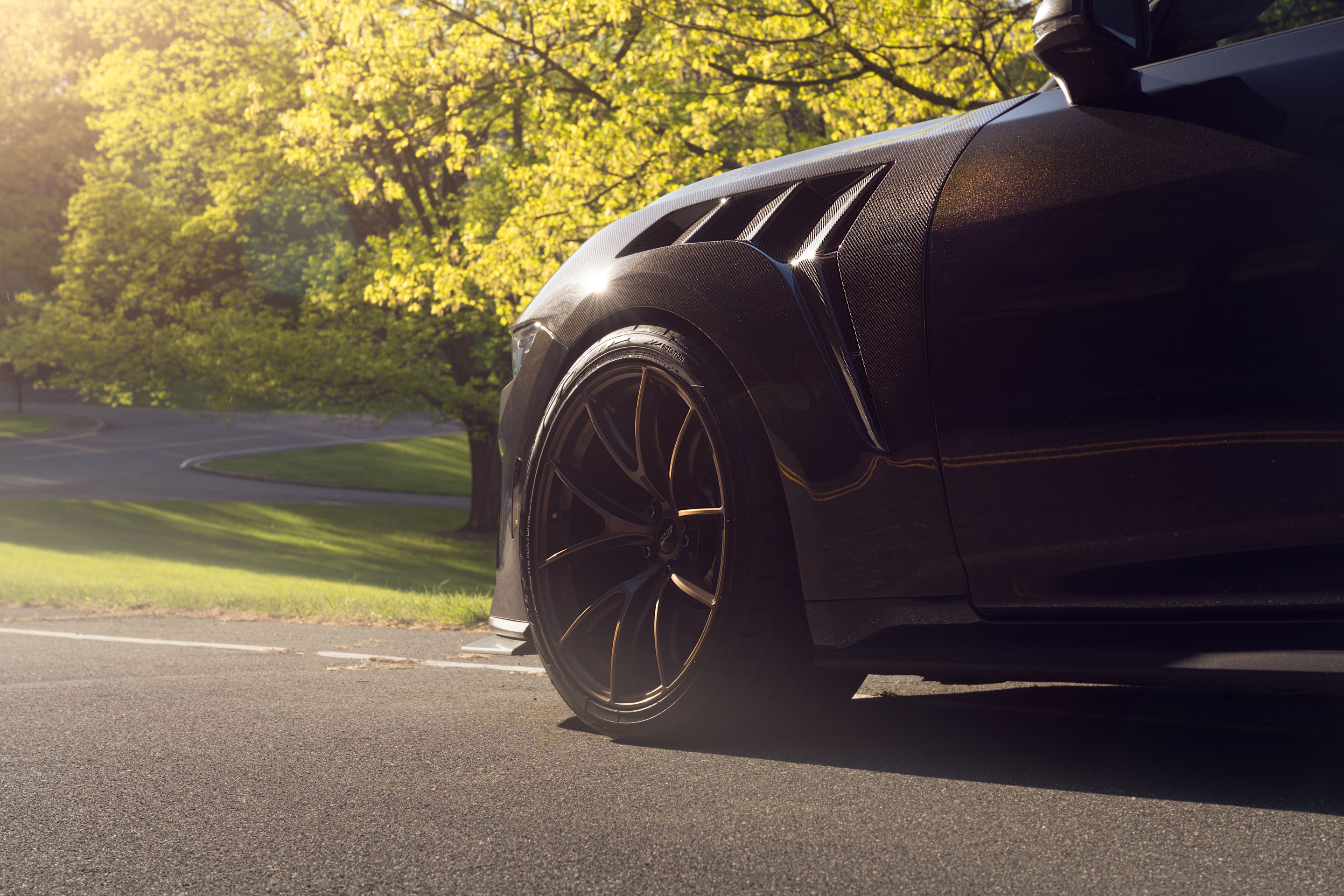 Orange Ford S650 Mustang Dark Horse with 20" VS-5RS Apex wheels in Satin Bronze