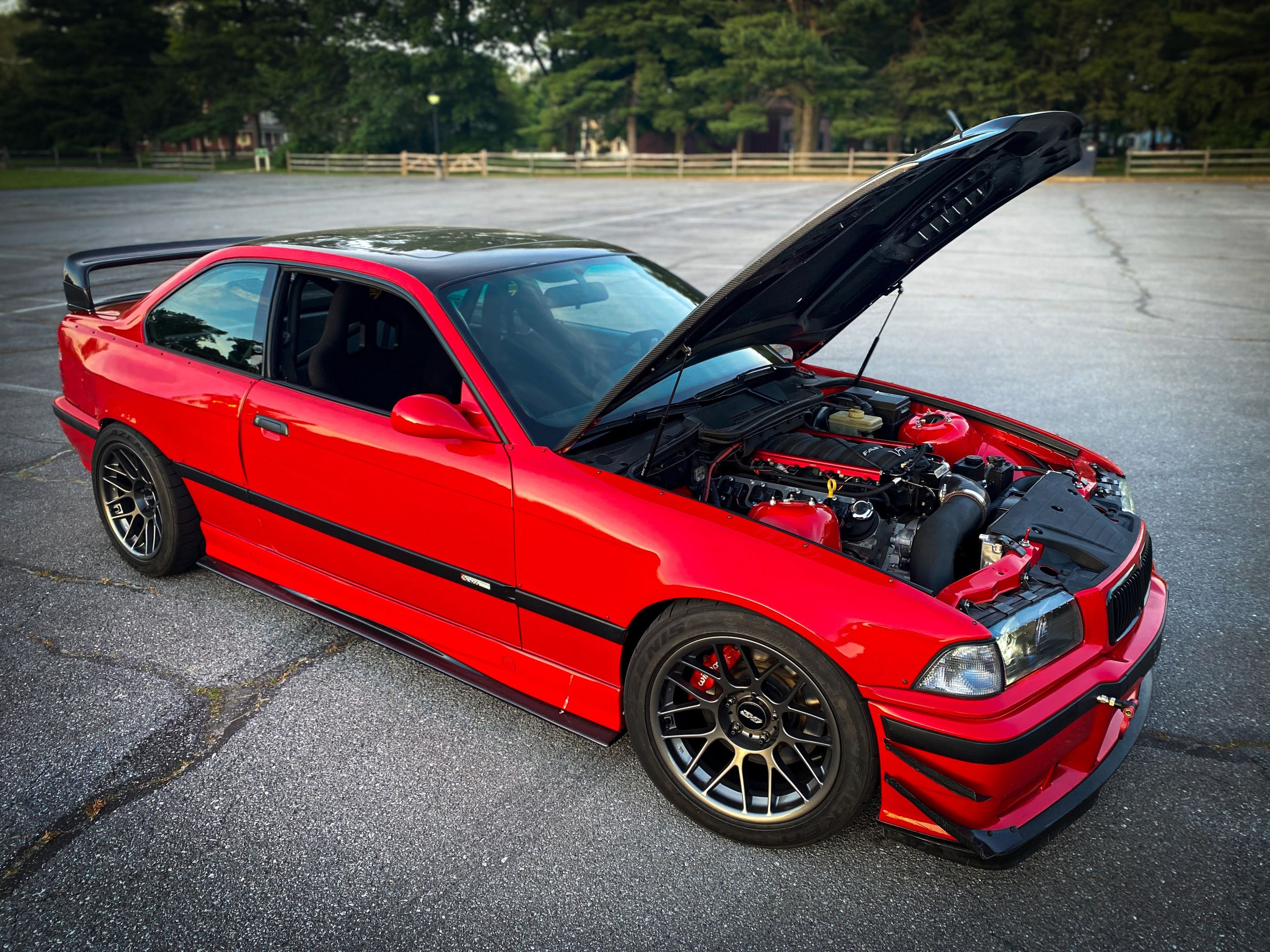 Red BMW E36 M3 with 17" ARC-8 Apex wheels in Anthracite