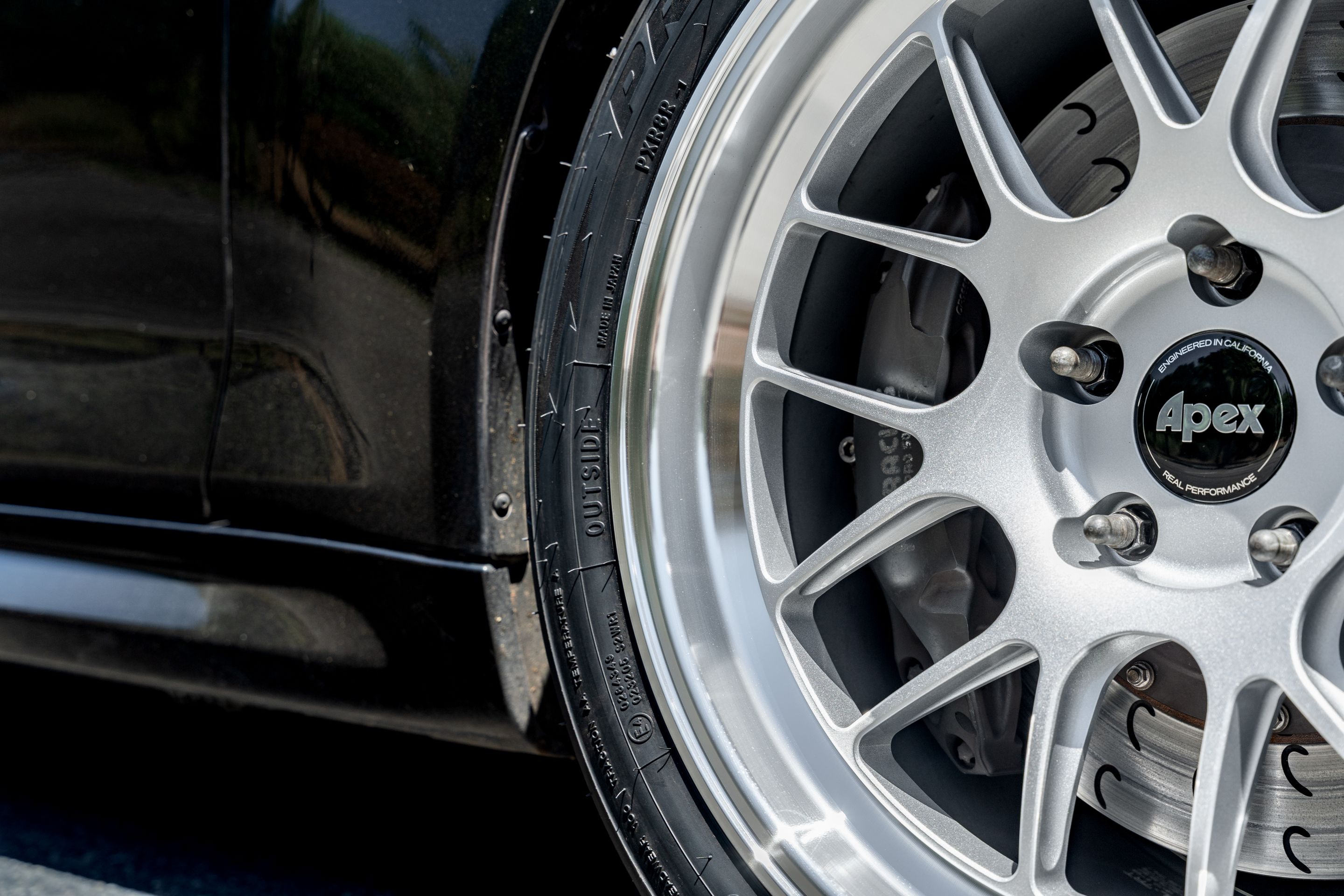 Black BMW F87 M2 with 18" ML-7RT Apex wheels in Machined Lip Race Silver