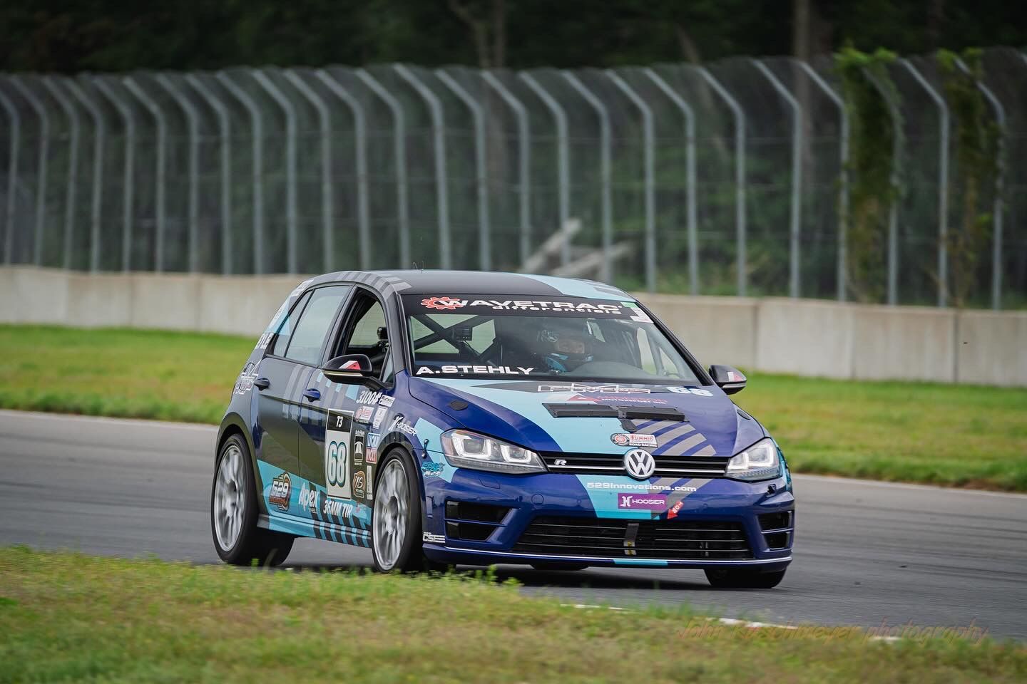 Race Livery VW MK7 Golf R with 18" SM-10 Apex wheels in Race Silver