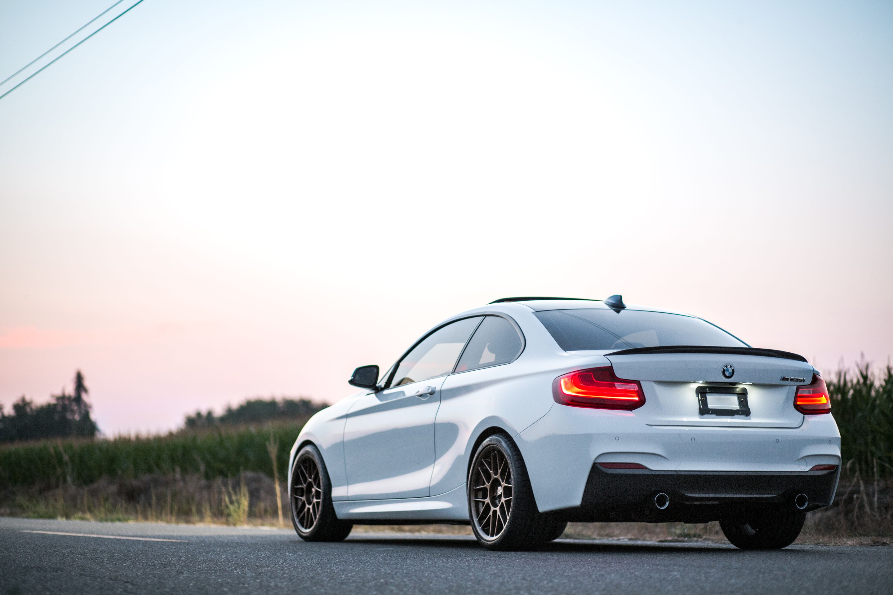 White BMW F22 Coupe 2 Series with 18" ARC-8 Apex wheels in Satin Bronze