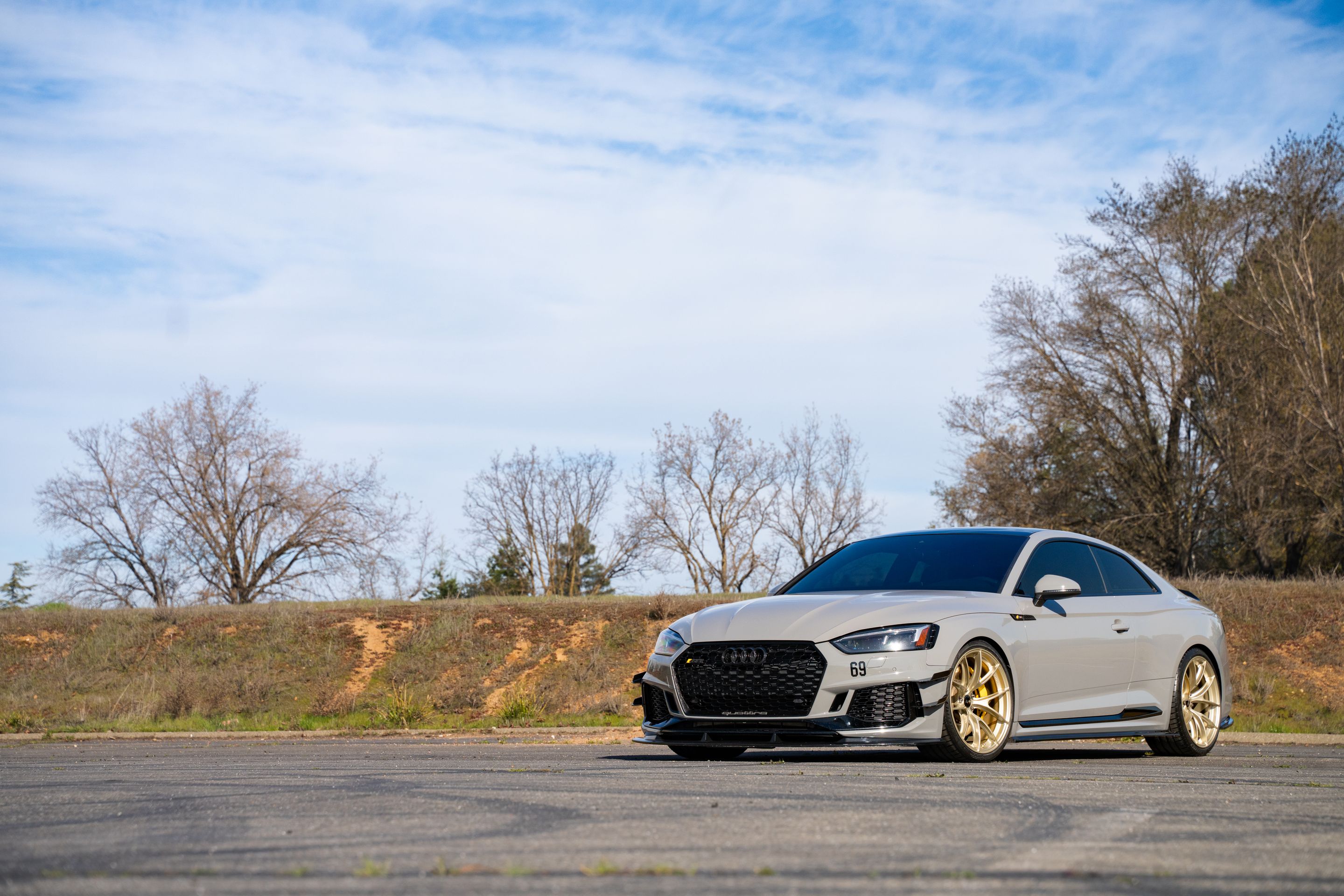 Grey Audi B9 RS 5 Coupe with 20" VS-5RS Apex wheels in Motorsport Gold