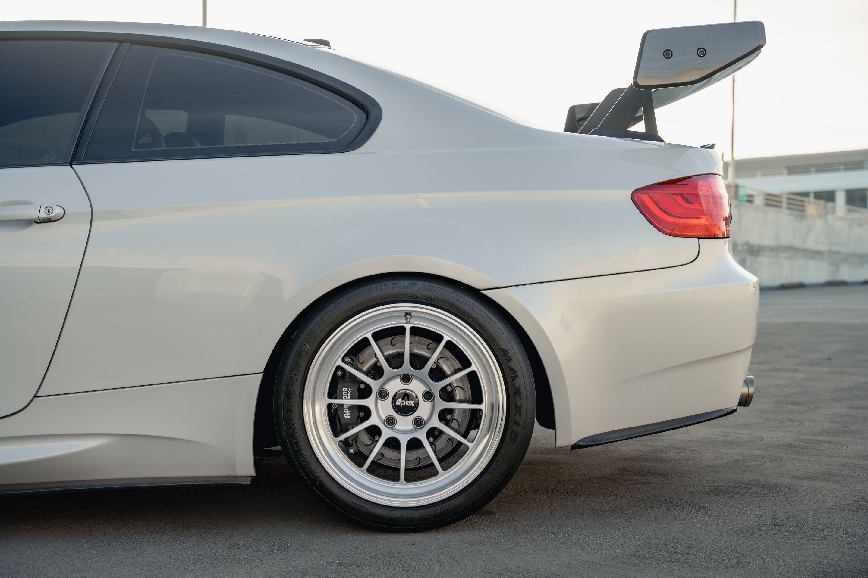 White BMW E92 Coupe M3 with 18" SL-12 Apex wheels in Machined Lip Race Silver