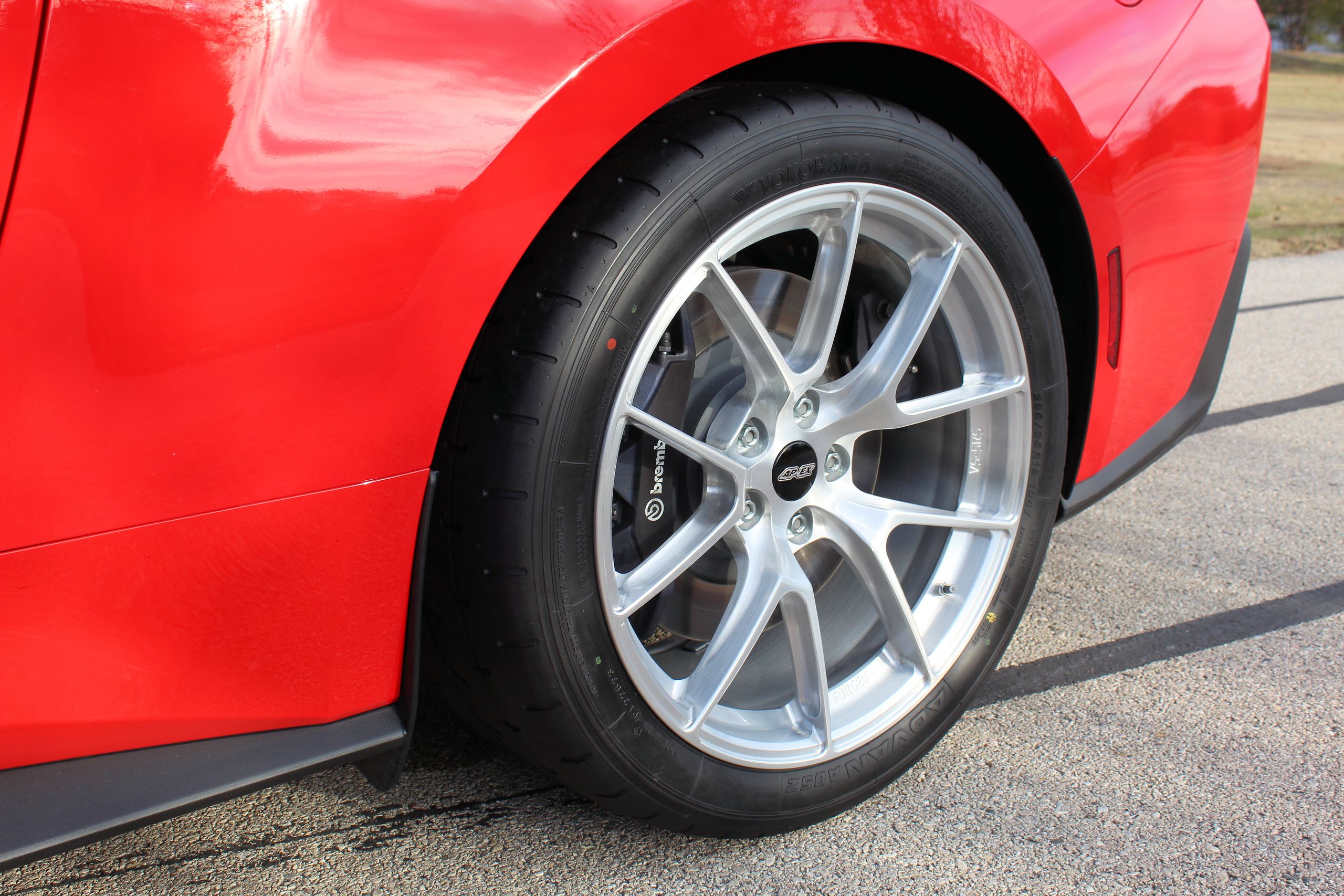 Red Ford S650 Mustang Dark Horse with 19" VS-5RS Apex wheels in Brushed Clear