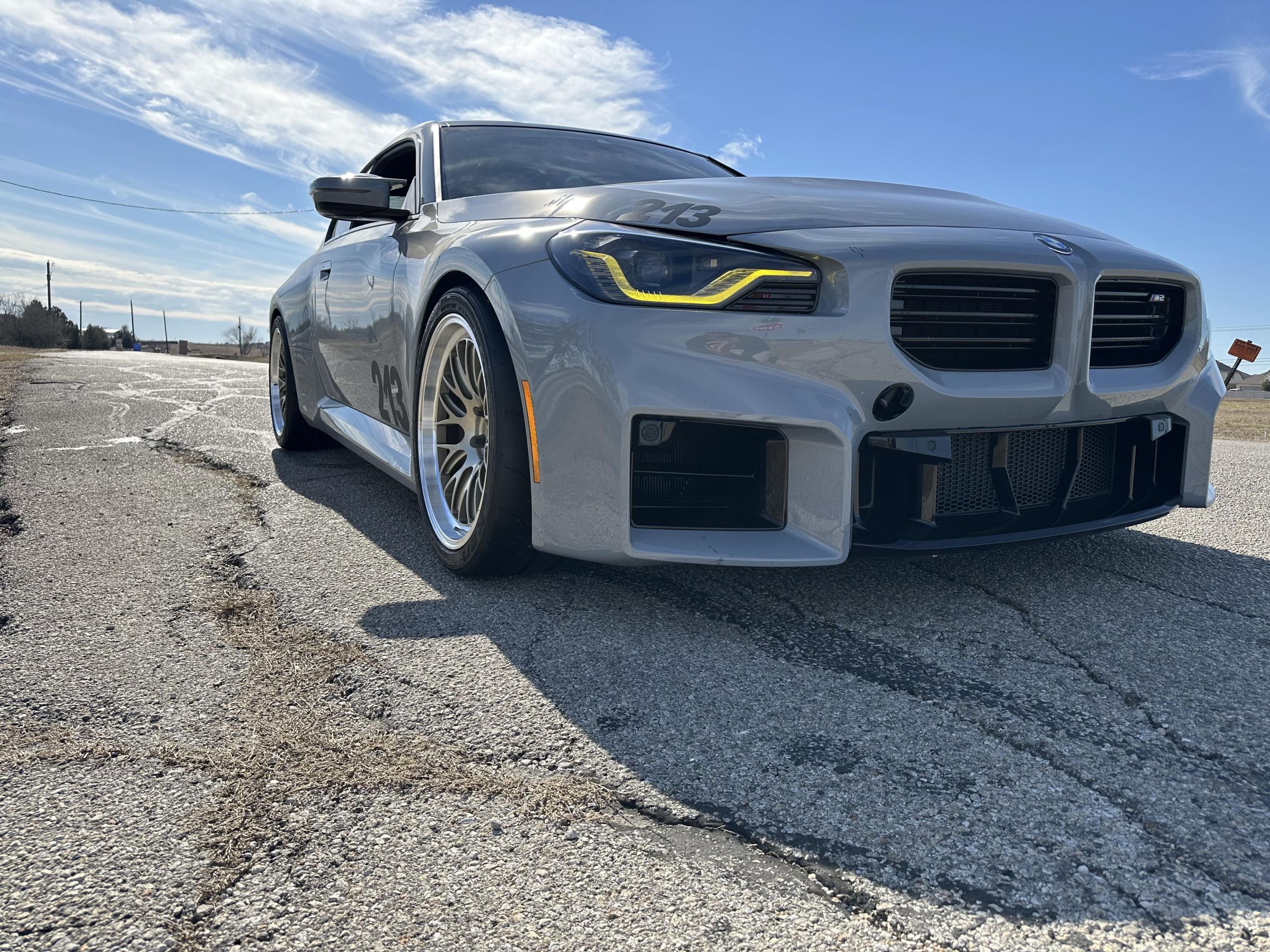 Grey BMW G87 M2 with 19" ML-10RT Apex wheels in Machined Lip Gloss Motorsport Gold