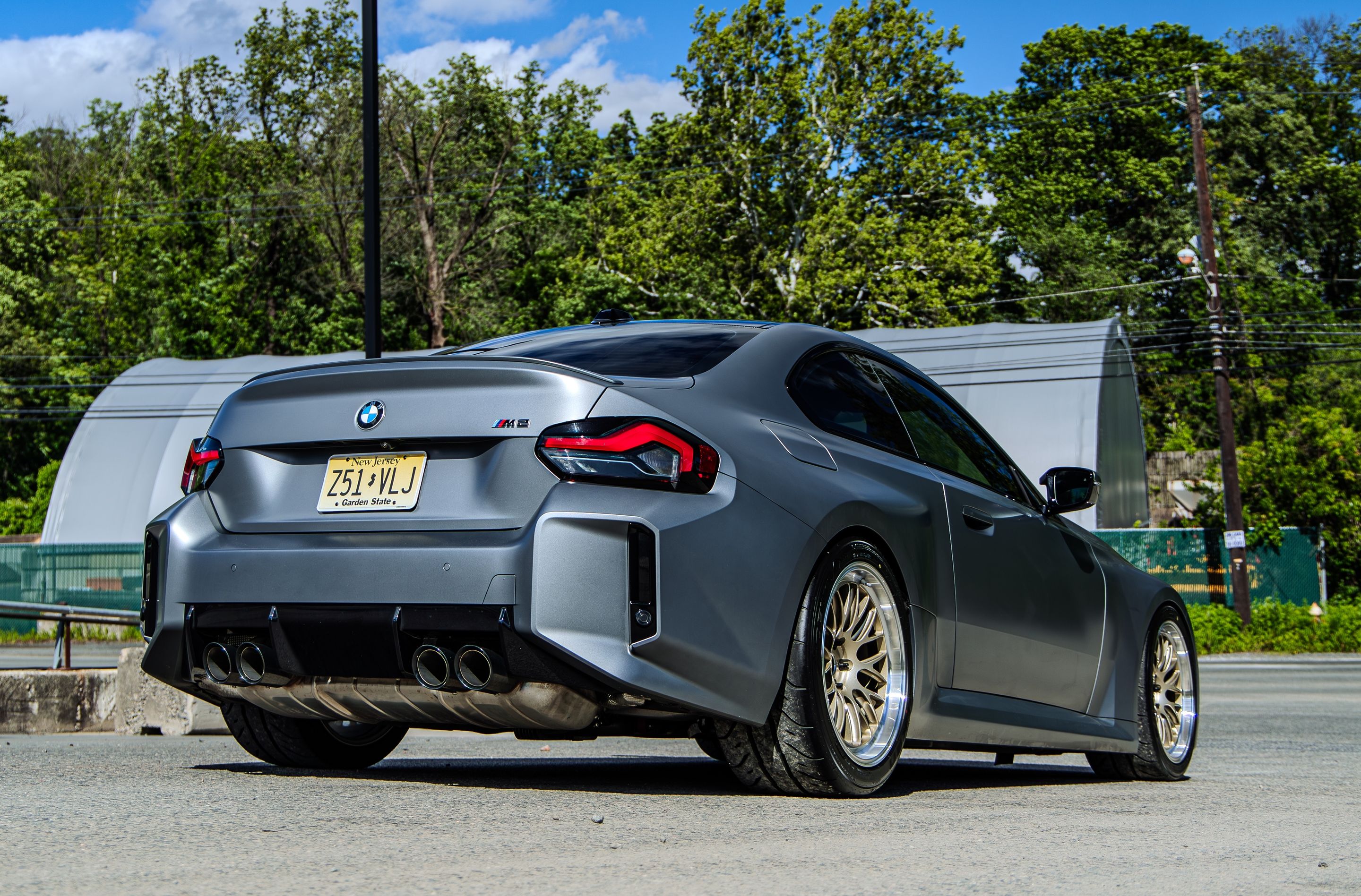 Grey BMW G87 M2 with 19" ML-10RT Apex wheels in Machined Lip Gloss Motorsport Gold