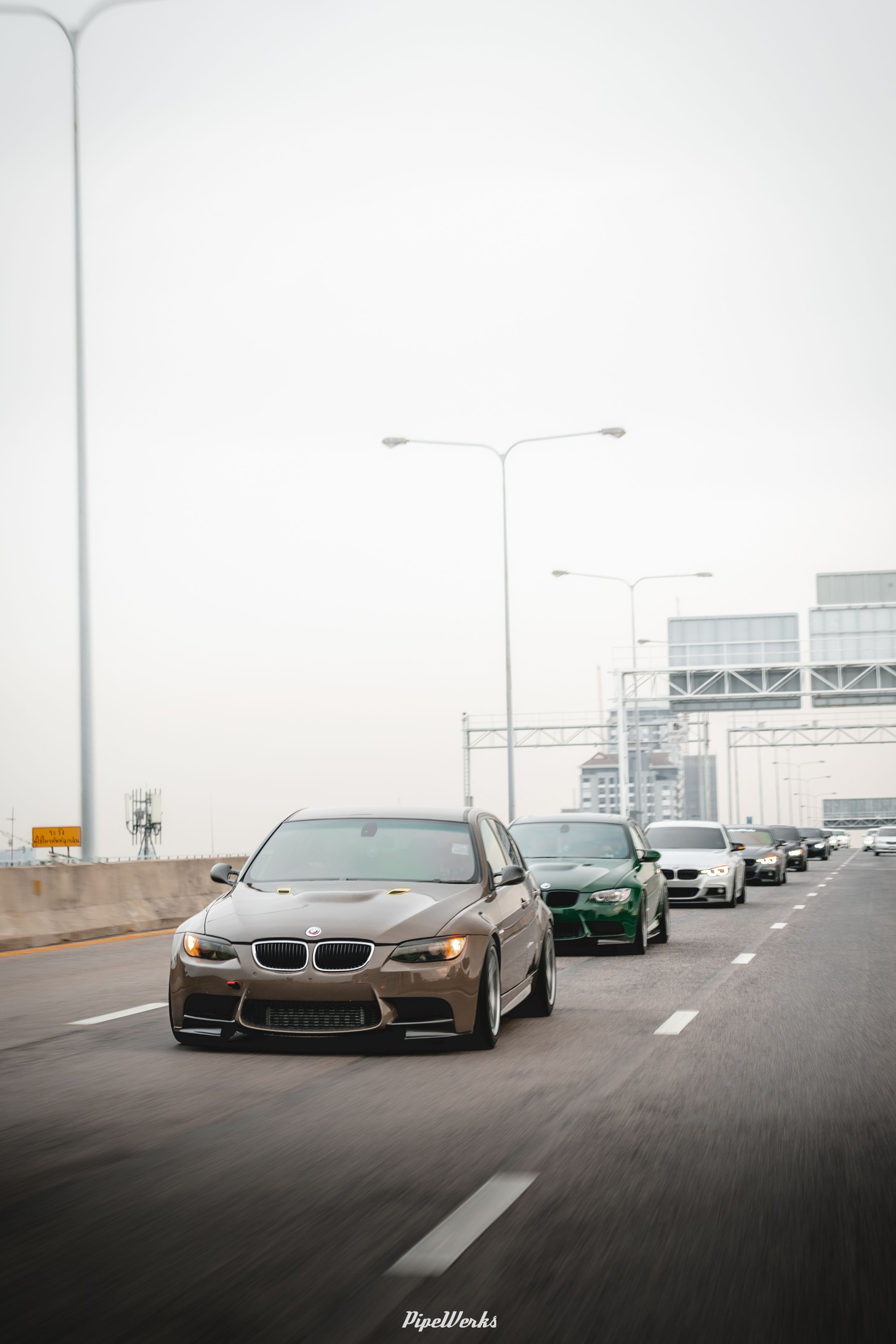 Brown BMW E90 Sedan 3 Series with 18" ARC-8 Apex wheels in Hyper Black