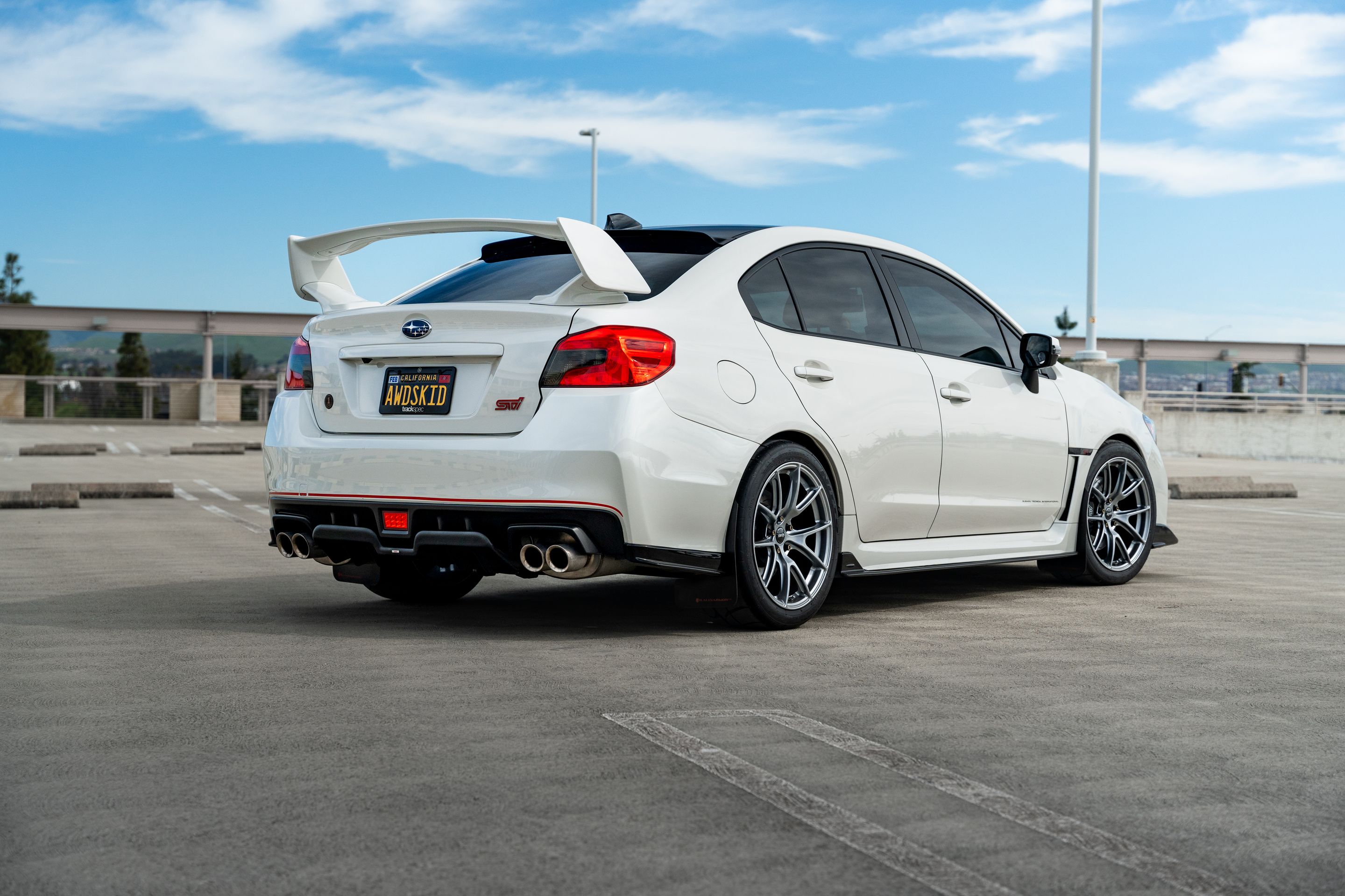 White Subaru VA WRX STI with 18" VS-5 Apex wheels in Hyper Black
