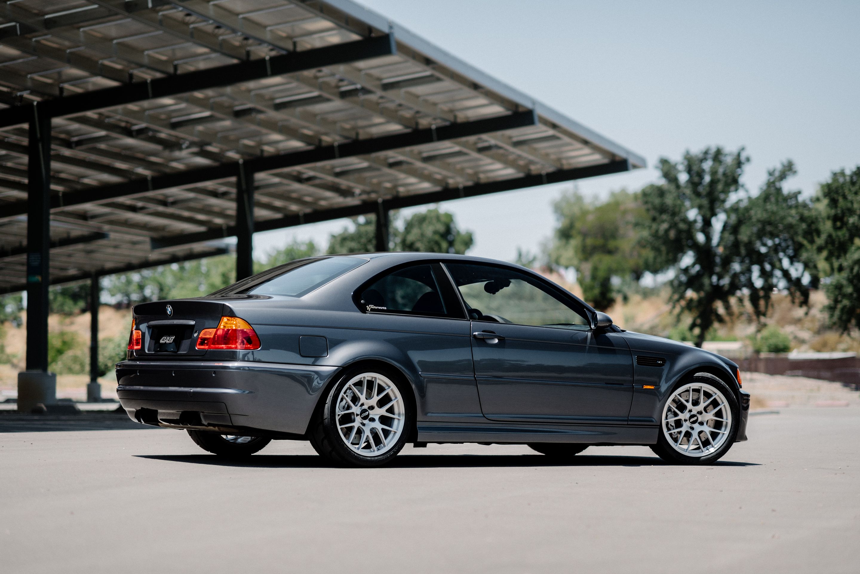 Grey BMW E46 M3 with 18" EC-7R Apex wheels in Brushed Clear