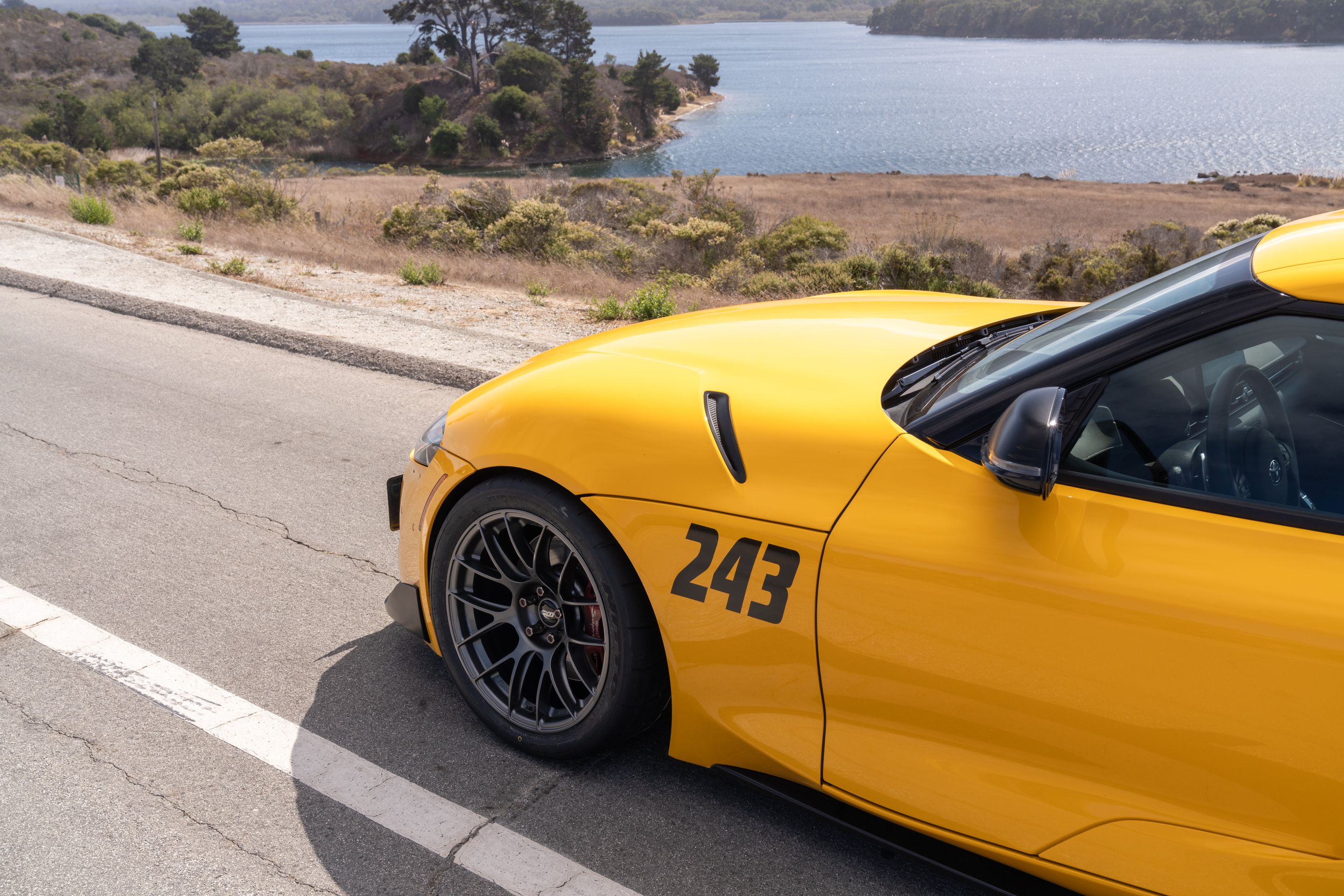 Yellow Toyota GR Supra with 18" EC-7RS Apex wheels in Anthracite