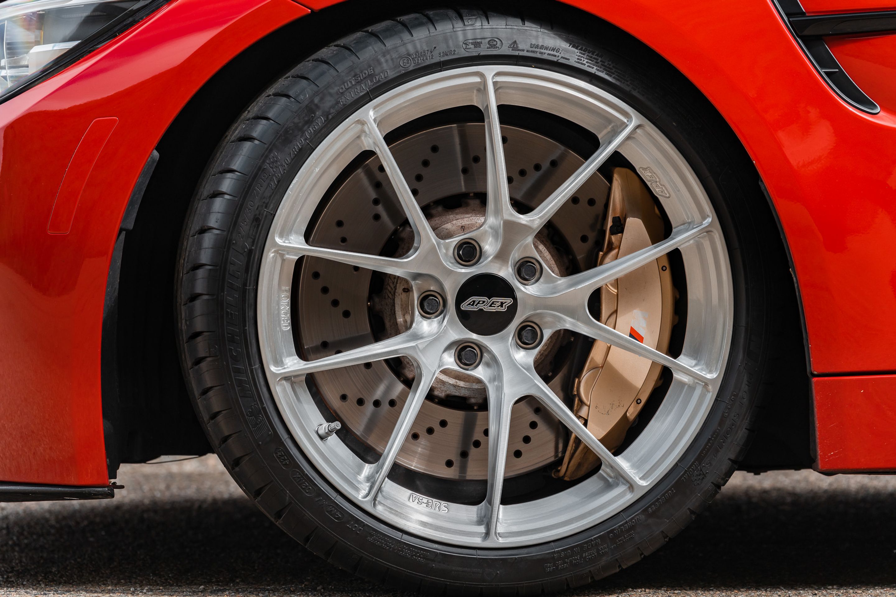 Red BMW F82 Coupe M4 with 19" VS-5RS Apex wheels in Brushed Clear