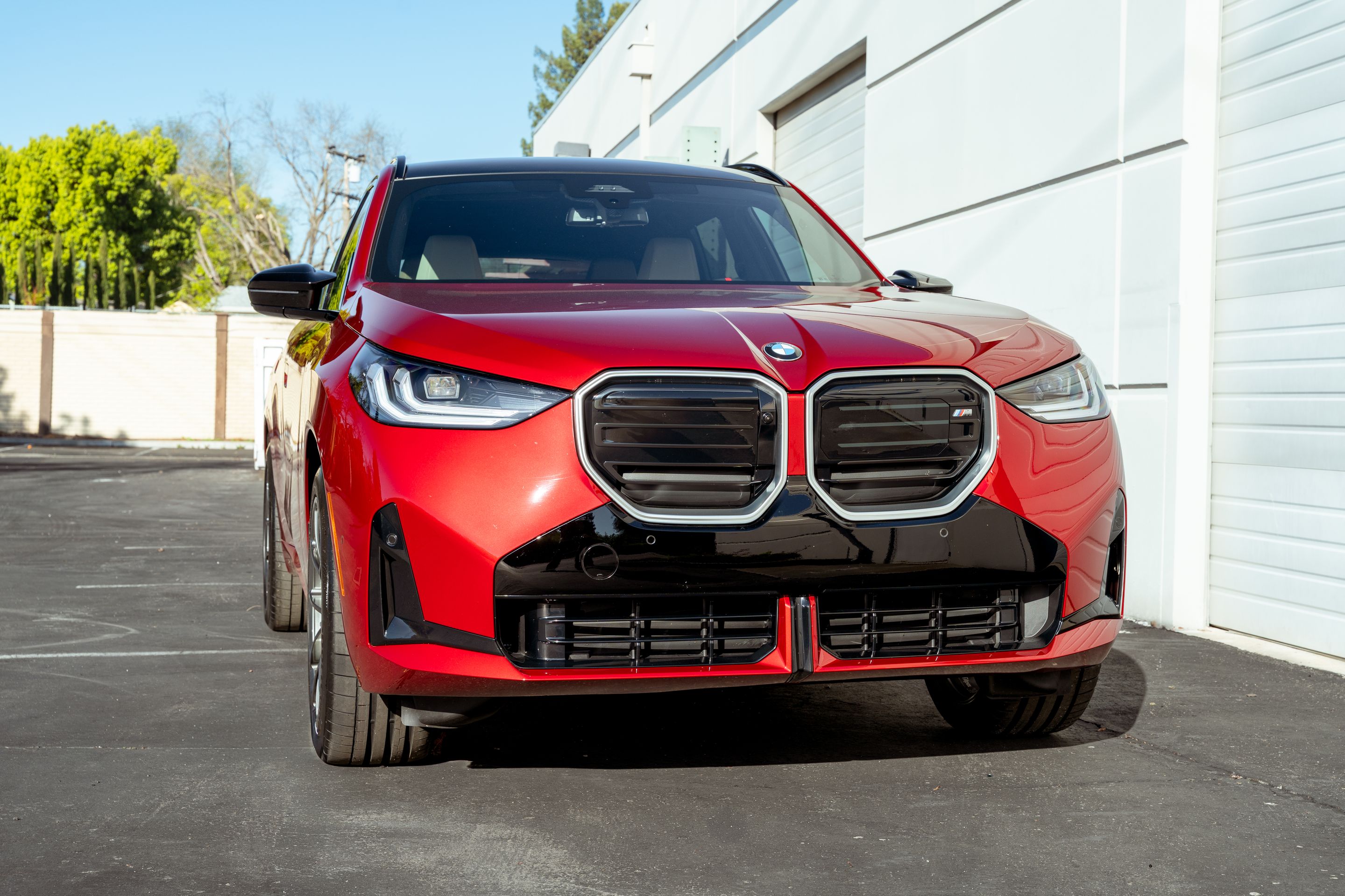 Red BMW G45 X3 with 20" VS-5RX Apex wheels in Anthracite