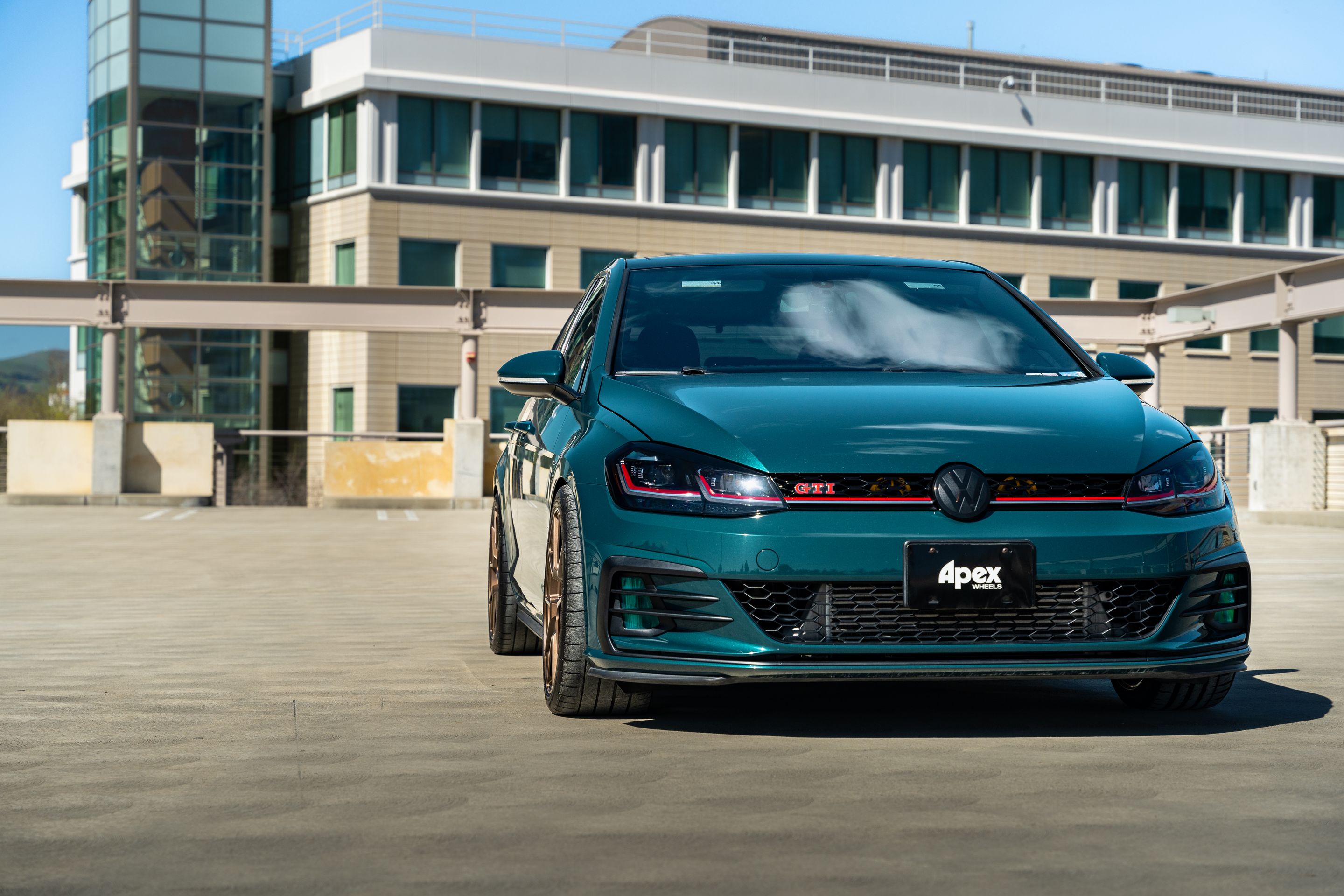 Green VW MK7 GTI with 18" VS-5 Apex wheels in Satin Bronze