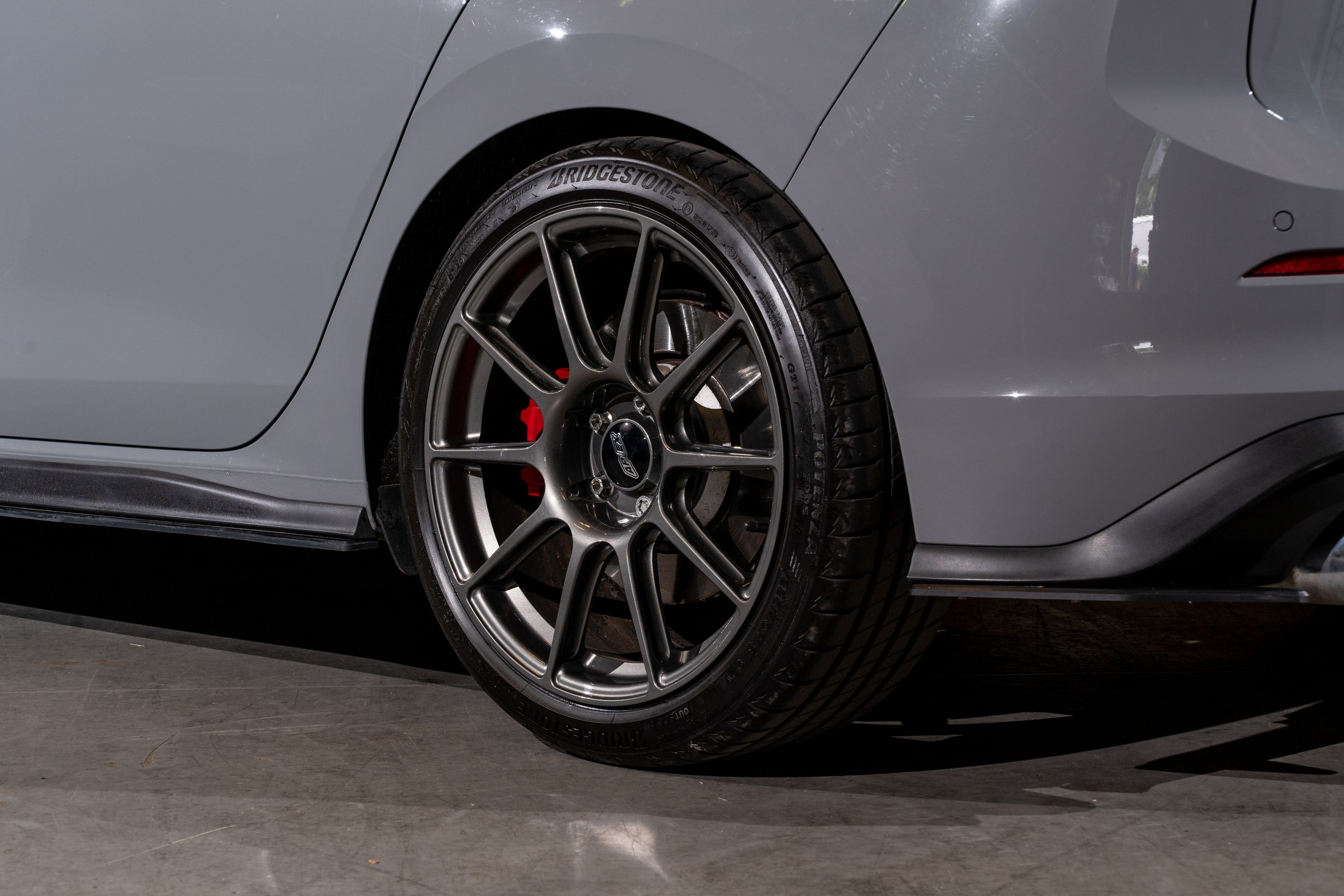 Grey VW MK8 GTI with 18" SM-10 Apex wheels in Anthracite