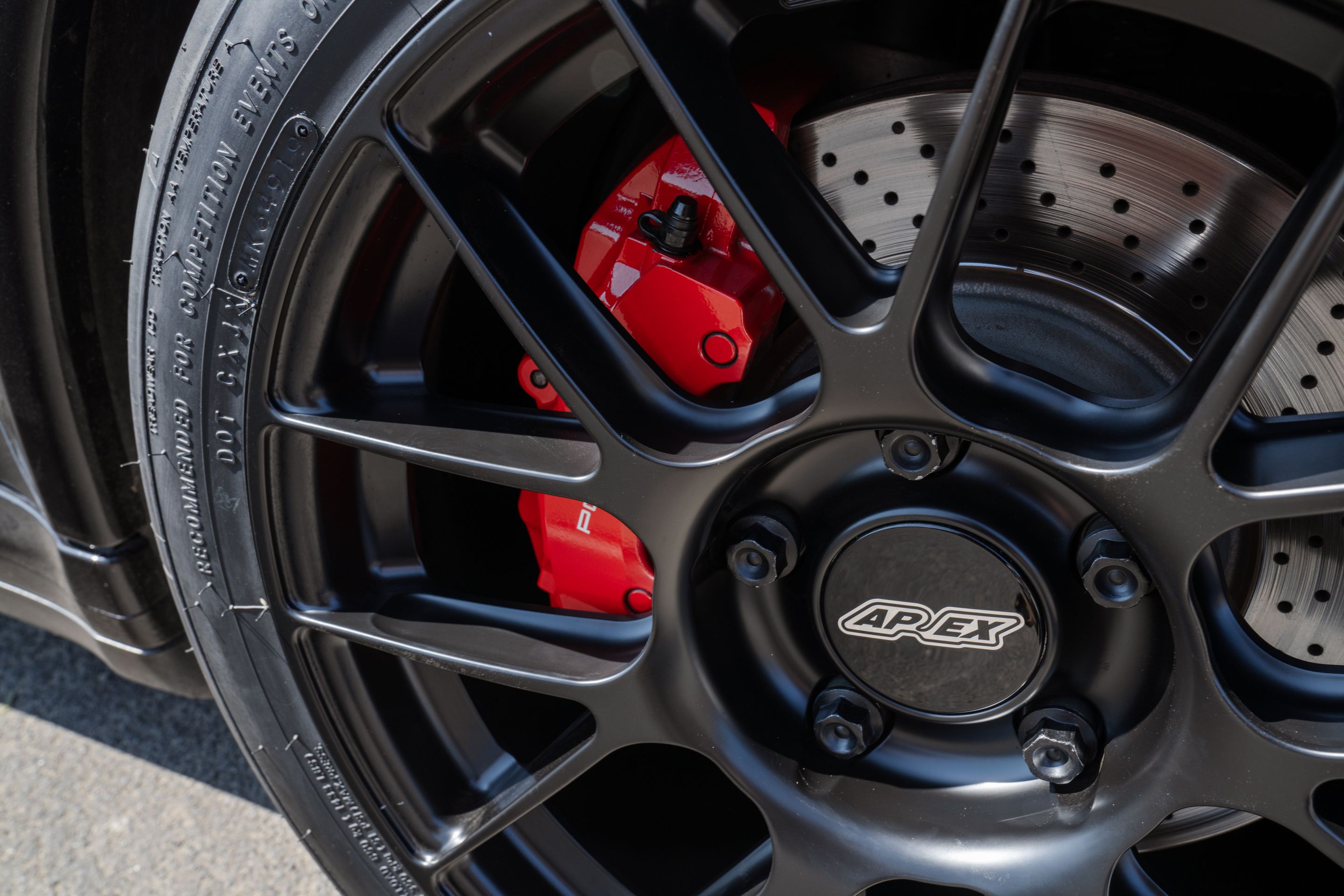 Black Porsche 911 997 Carrera 4S with 18" EC-7RS Apex wheels in Satin Black