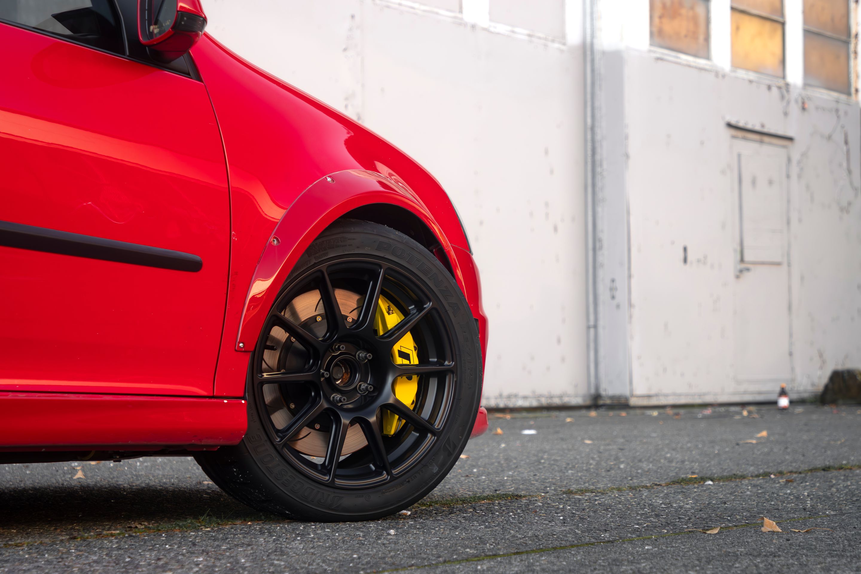 Red VW MK5 Golf with 17" SM-10 Apex wheels in Satin Black
