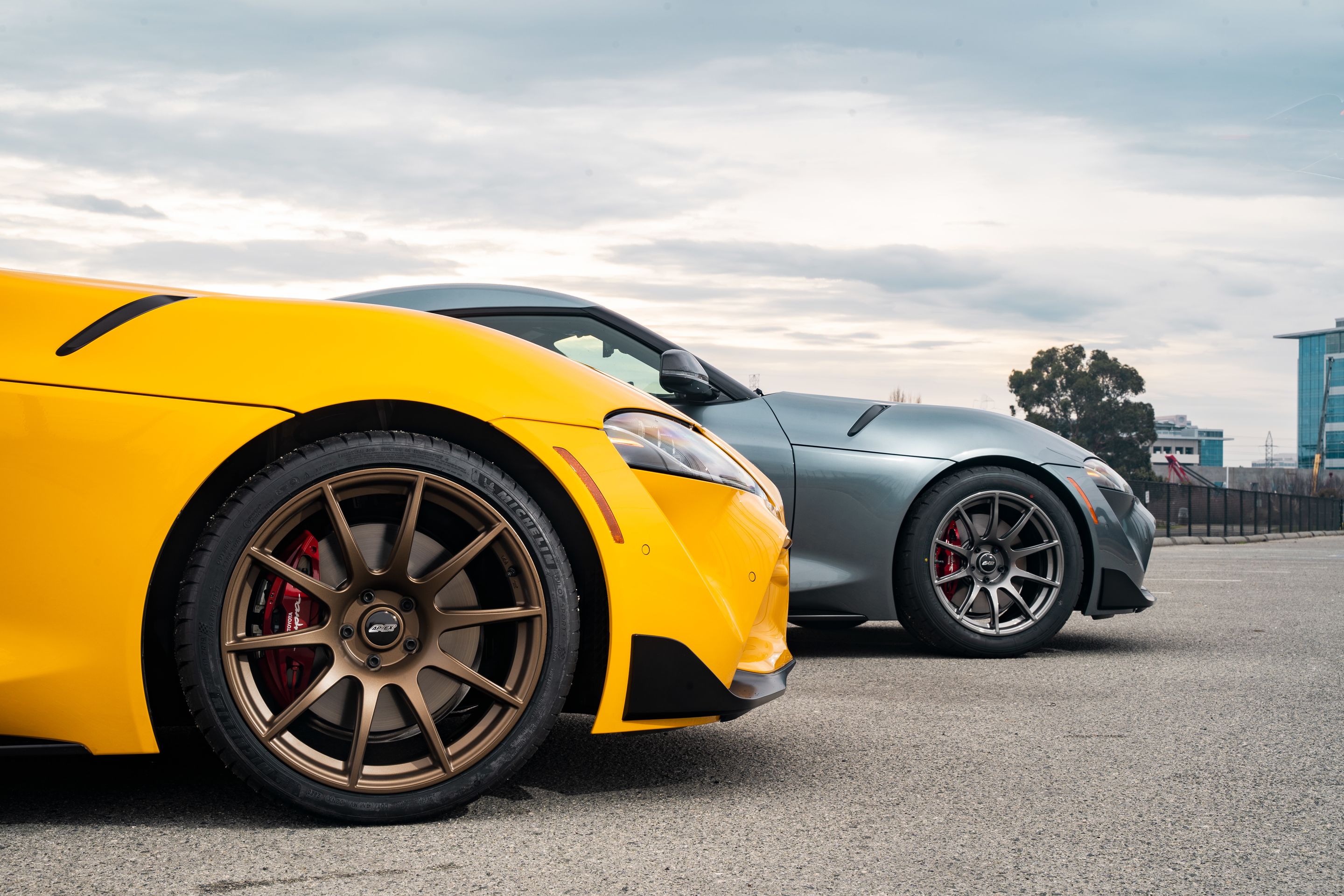 Yellow Toyota GR Supra with 19" SM-10 Apex wheels in Satin Bronze