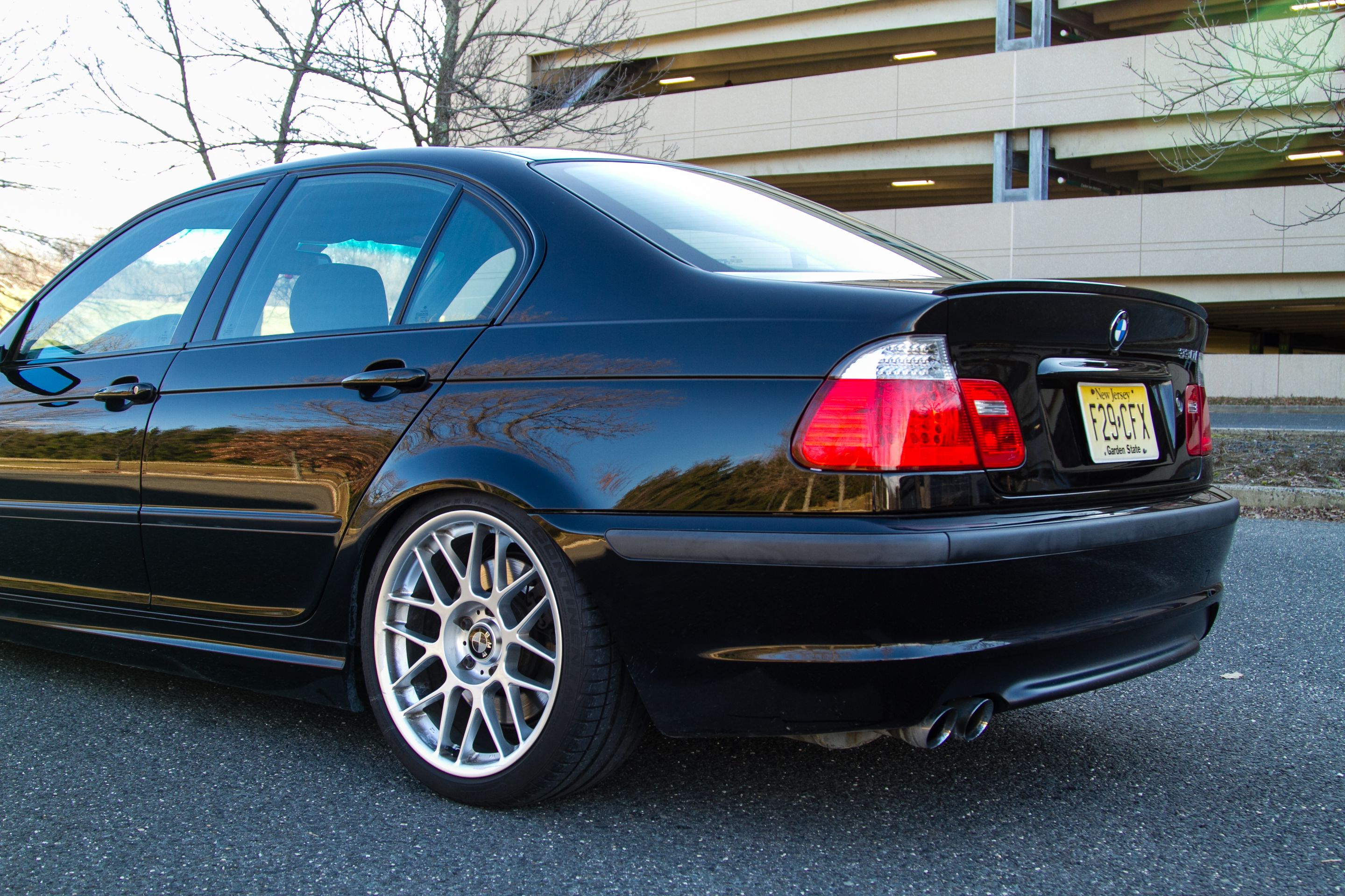 Black BMW E46 3 Series with 18" ARC-8 Apex wheels in Hyper Silver