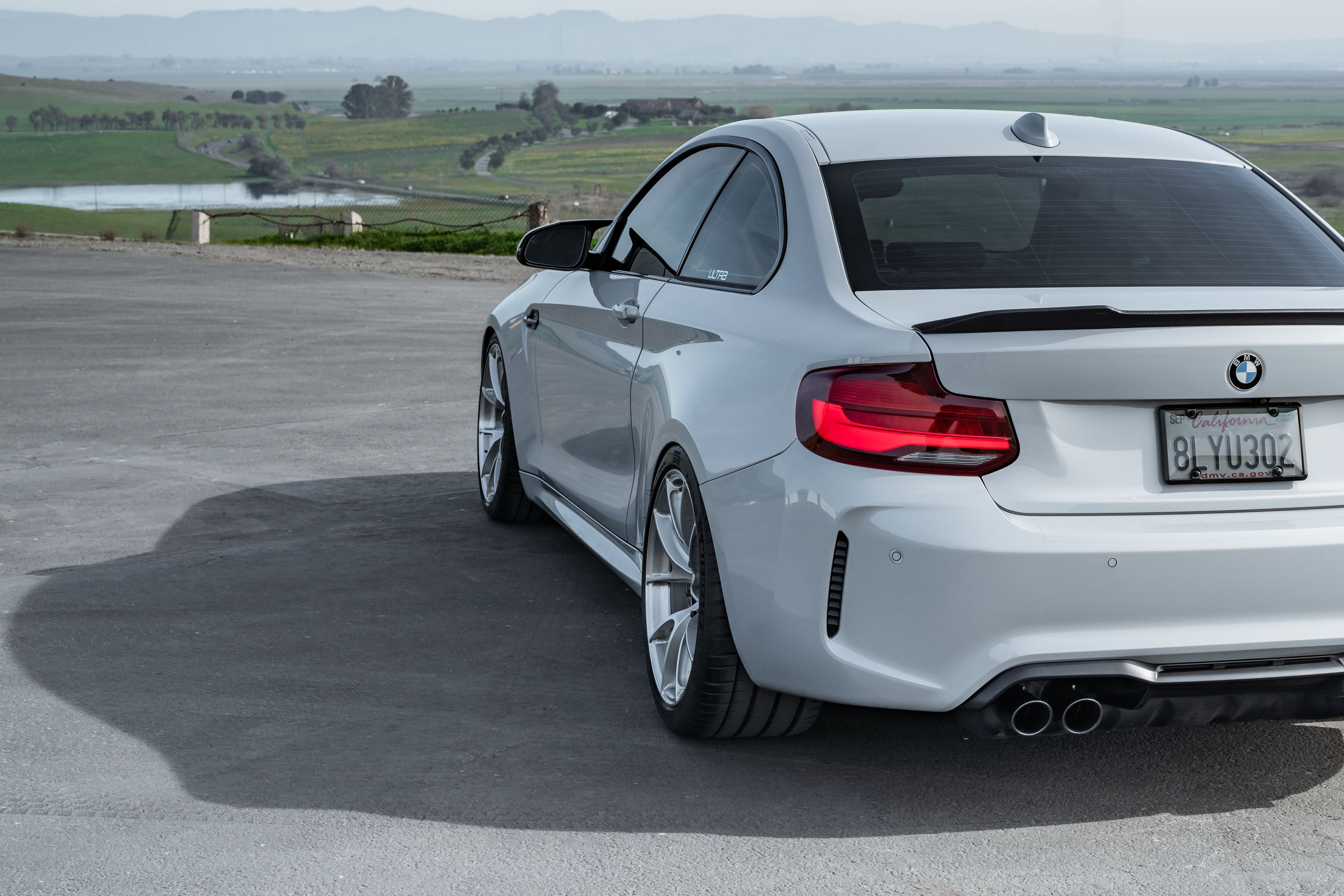 Silver BMW F87 M2 with 19" VS-5RS Apex wheels in Brushed Clear
