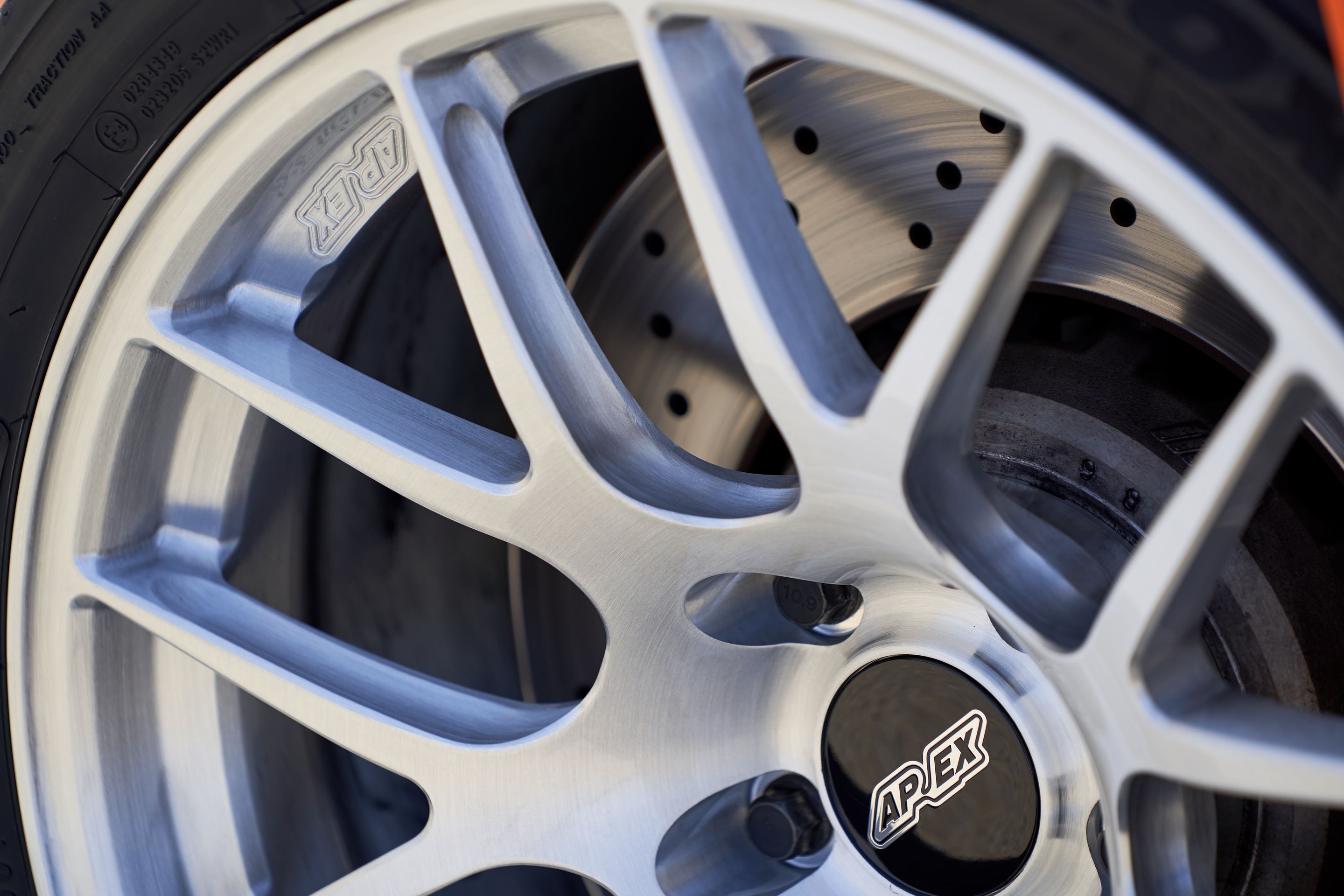 Orange BMW F80 M3 with 18" EC-7R Apex wheels in Brushed Clear