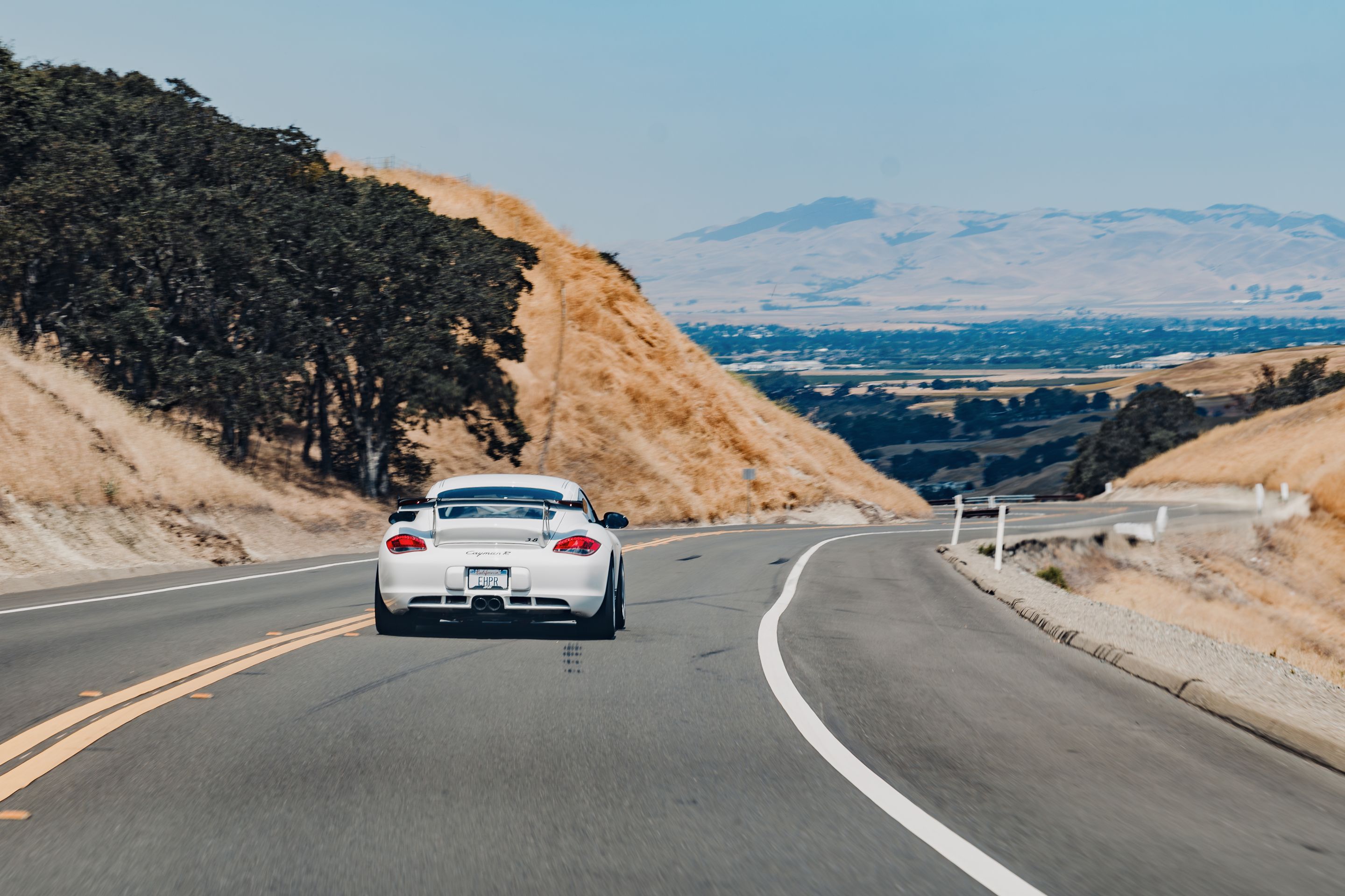 White Porsche 987 Cayman R with 18" EC-7RS Apex wheels in Race Silver