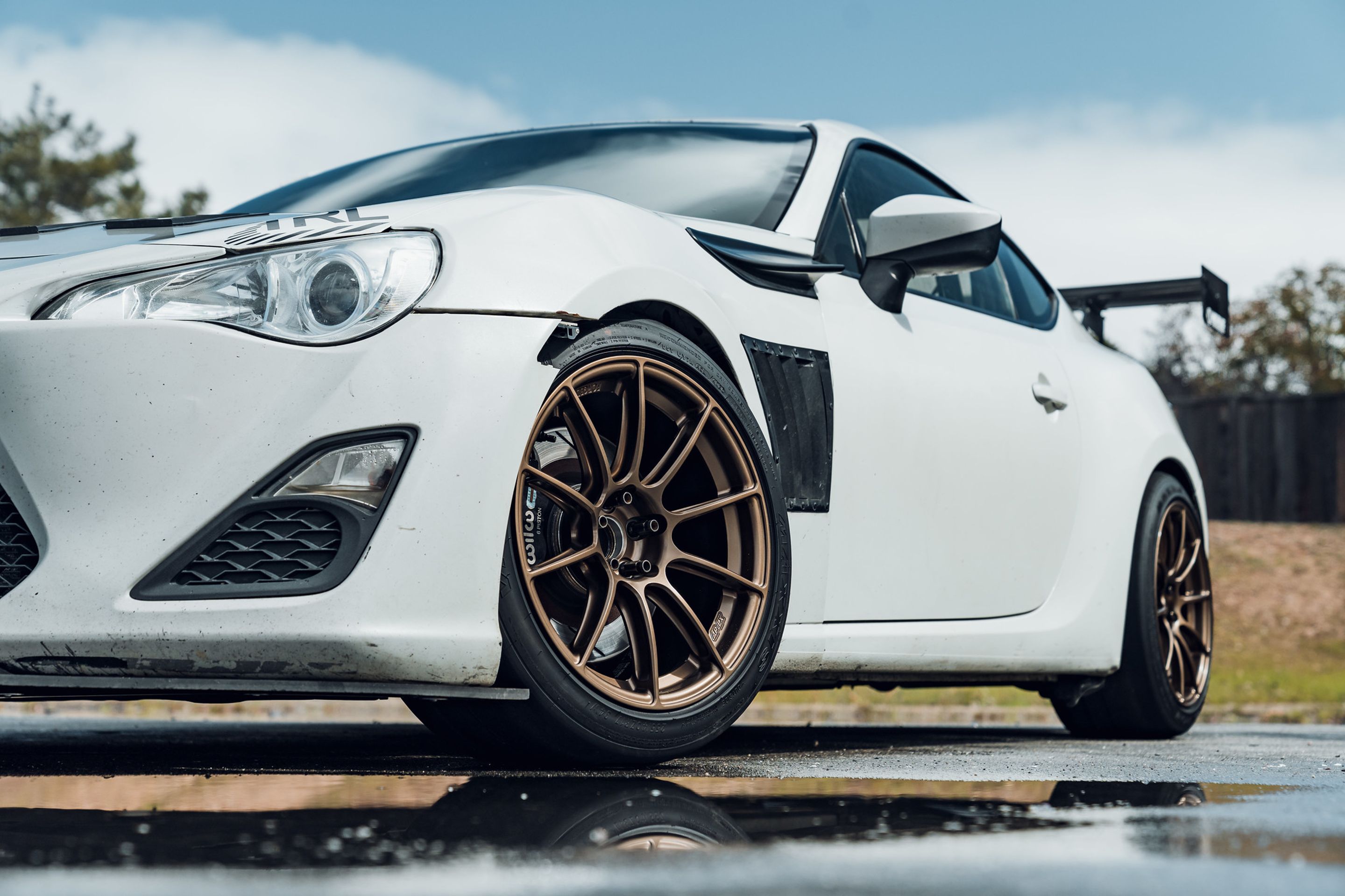 White Scion FR-S with 17" SM-10RS Apex wheels in Satin Bronze