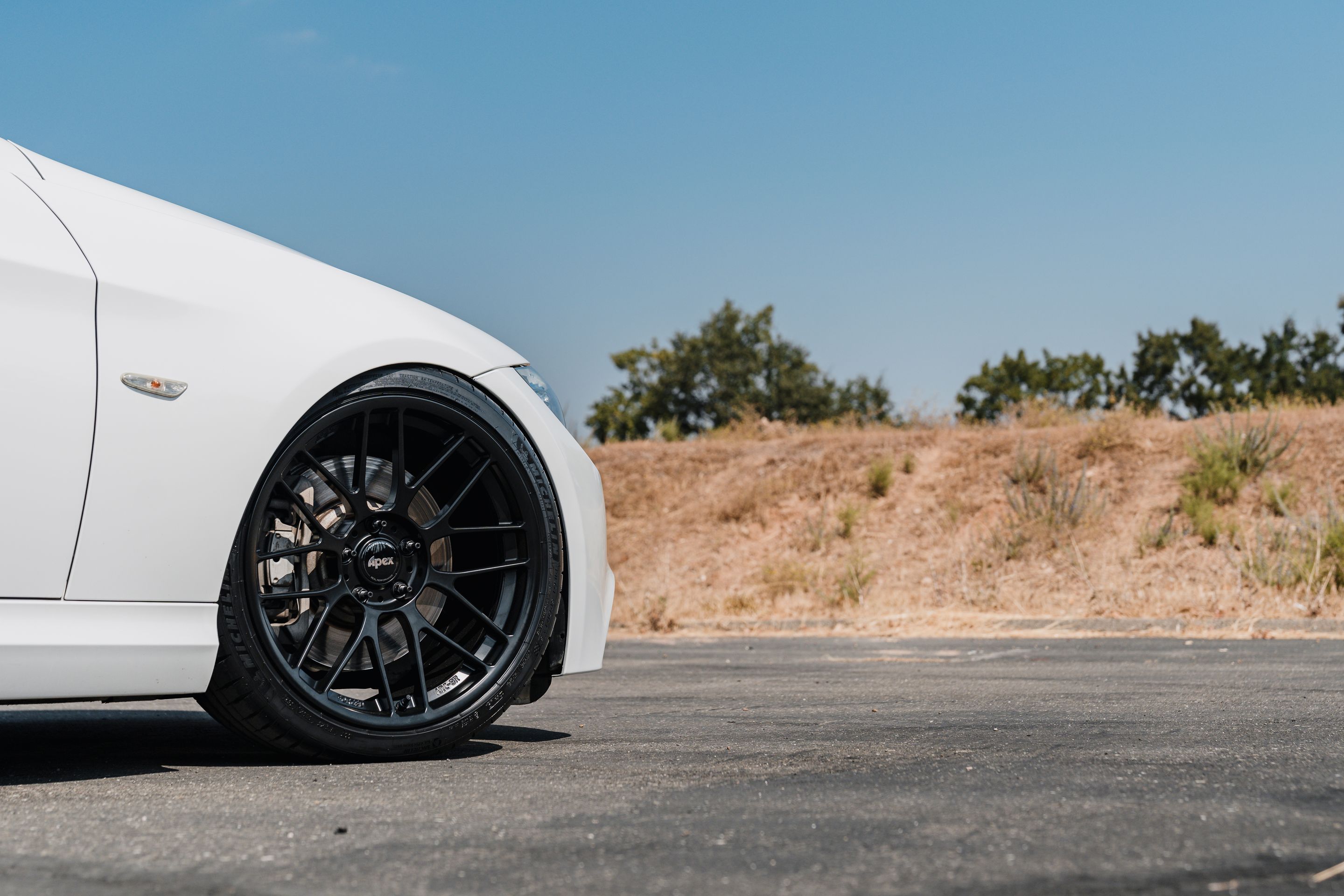 White BMW E90 LCI Sedan 3 Series with 19" ARC-8RT Apex wheels in Satin Black