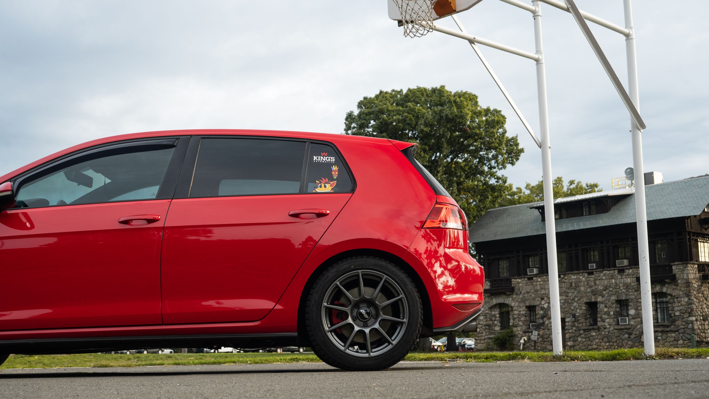 Red VW MK7 GTI with 17" SM-10 Apex wheels in Anthracite