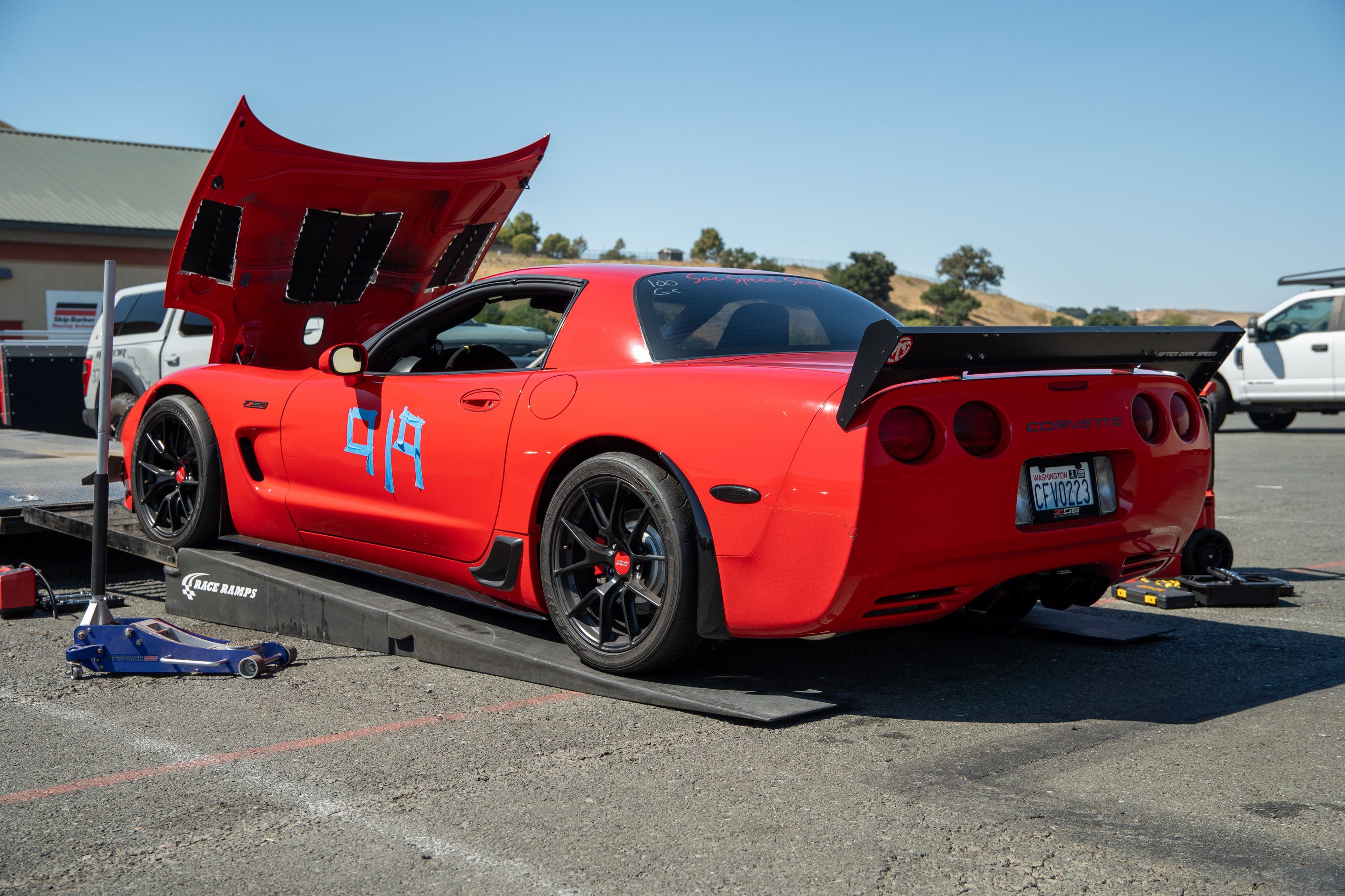 Red Chevrolet C5 Corvette Z06 with 18" VS-5RS Apex wheels in Satin Black