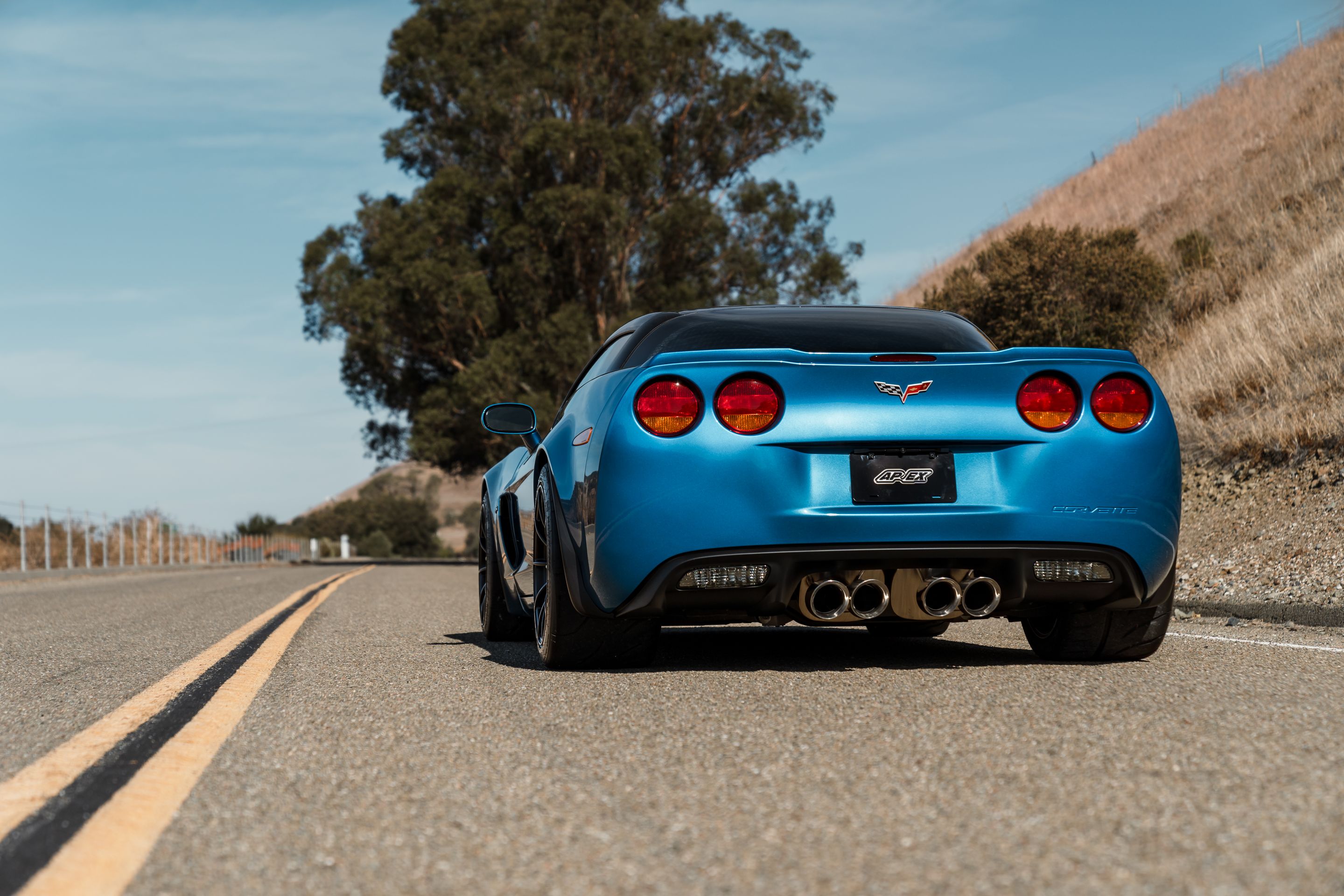 Blue Chevrolet C6 Corvette Z06 with 18" SM-10RS Apex wheels in Satin Black