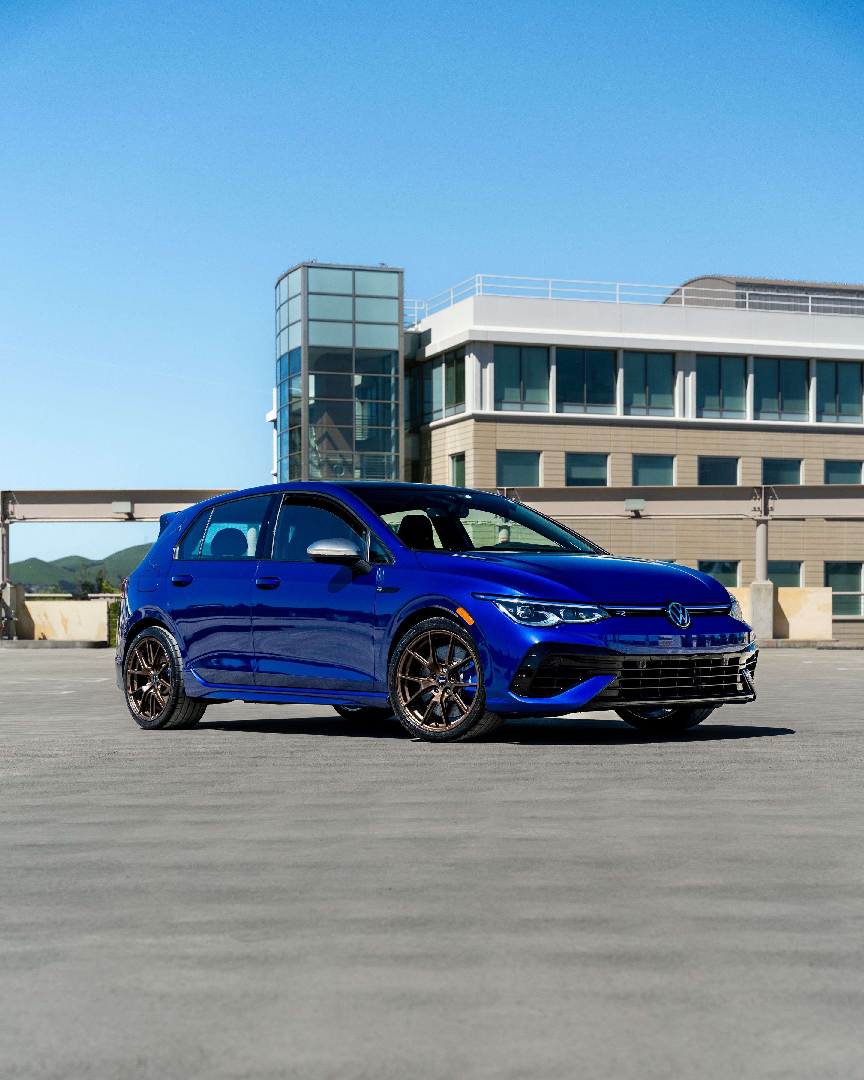 Blue VW MK8 Golf R with 18" VS-5 Apex wheels in Satin Bronze