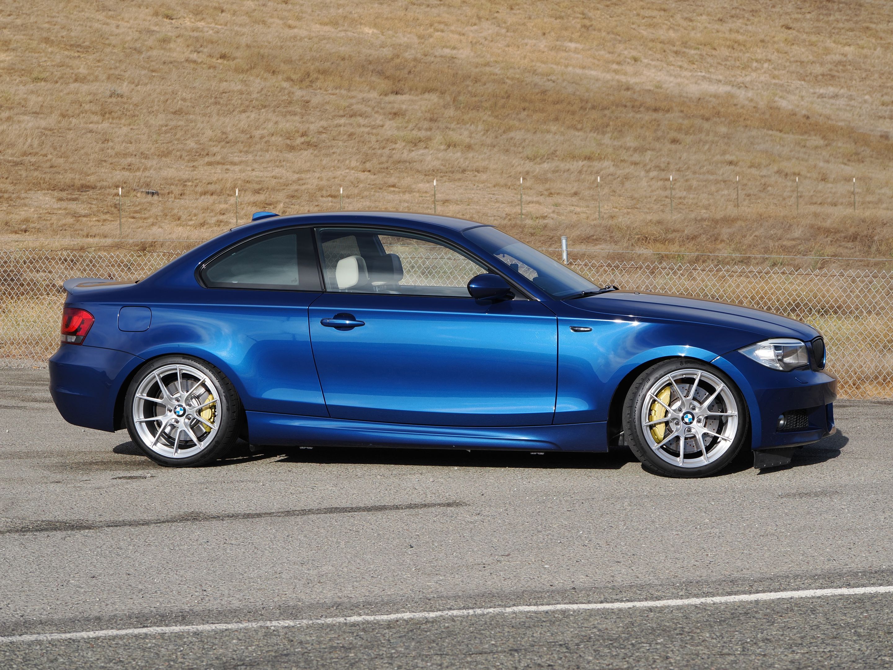 Blue BMW E82 Coupe 1 Series with 18" VS-5RS Apex wheels in Brushed Clear